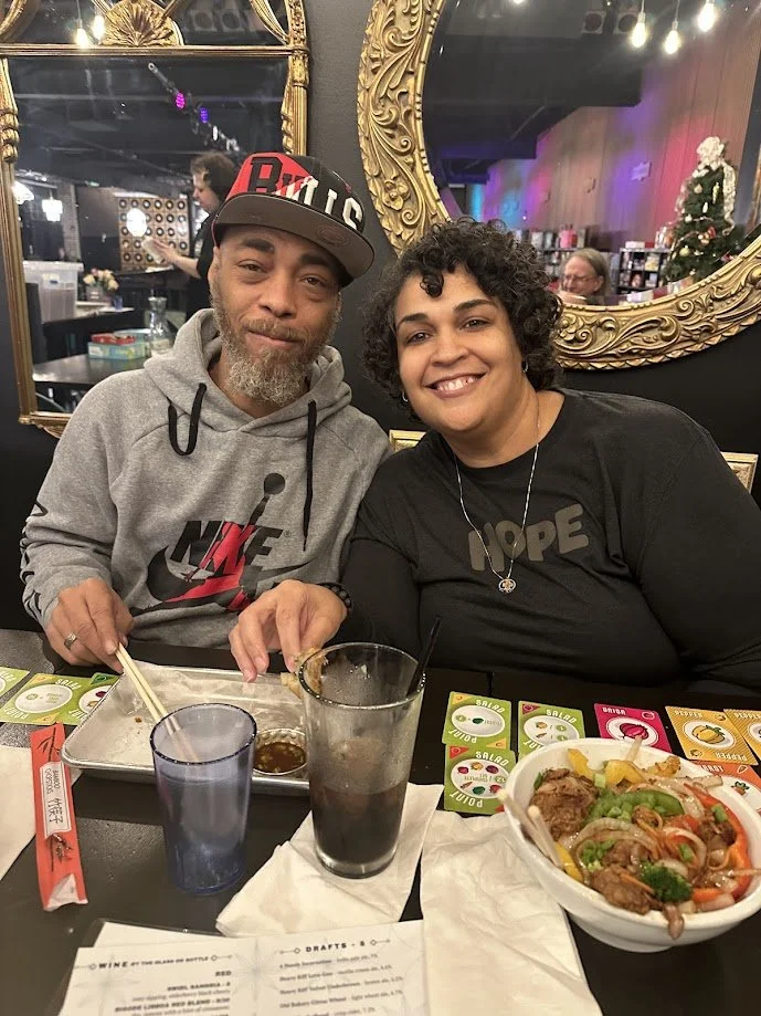 Tiffany with her husband, Jermaine, at our Vegan Game Night at Pieces Board Game Bar and Cafe in the Soulard neighborhood of St. Louis.jpg