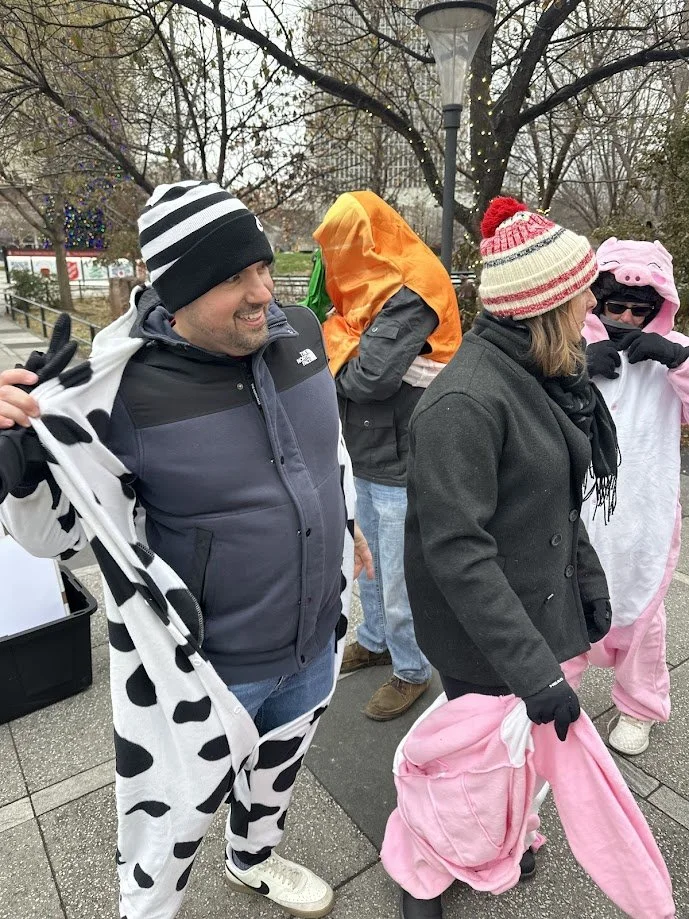 People removing their animal costumes at our anti-fur and anti-leather demonstration in downtown St. Louis.jpg