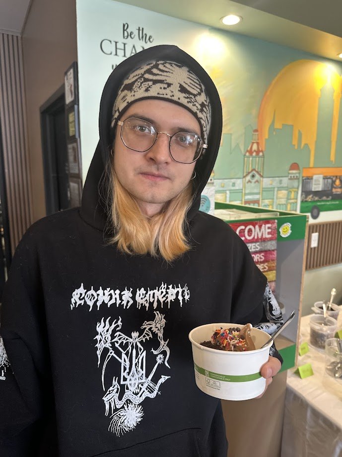 Vanya holding vegan ice cream at our Veganuary Vegan Ice Cream Social at Bombay Food Junkies in Creve Coeur, Missouri.jpg