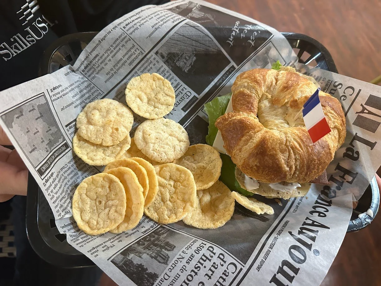 Vegan croissant sandwich with chips at La Vie Vegan Bistro in St. Charles, Missouri.jpg