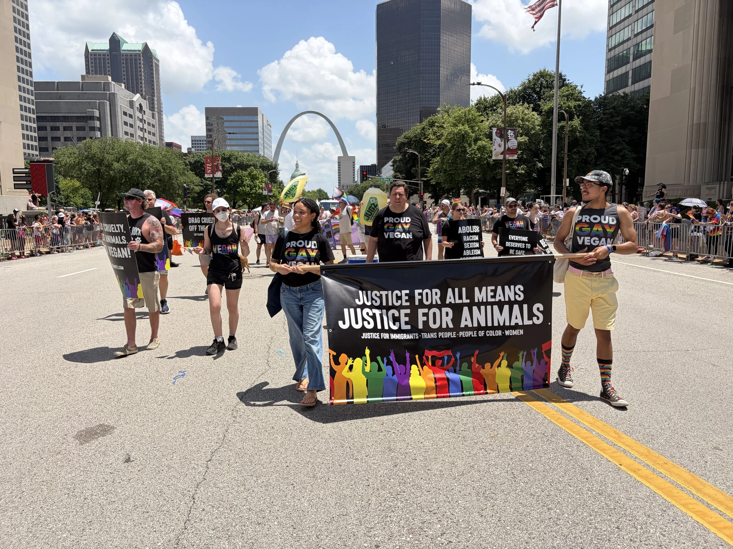 Queer vegan activists marching in our Vegan Pride Parade in downtown St. Louis at St. Louis PrideFest.jpg