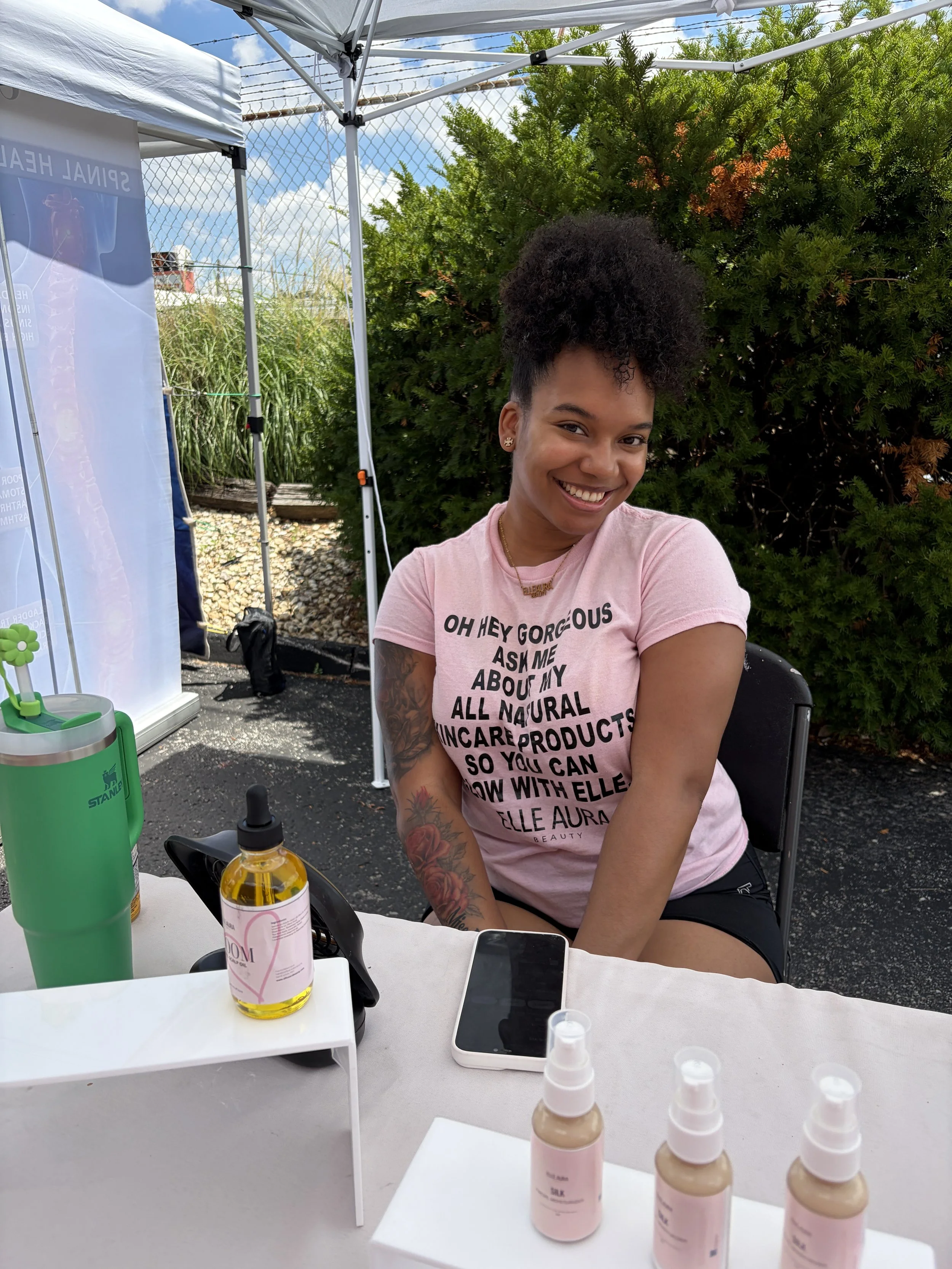 Elle Aura Beauty owner smiles for a photo at the Vegan Block Party at Bougie Bites in St. Louis, Missouri.jpg