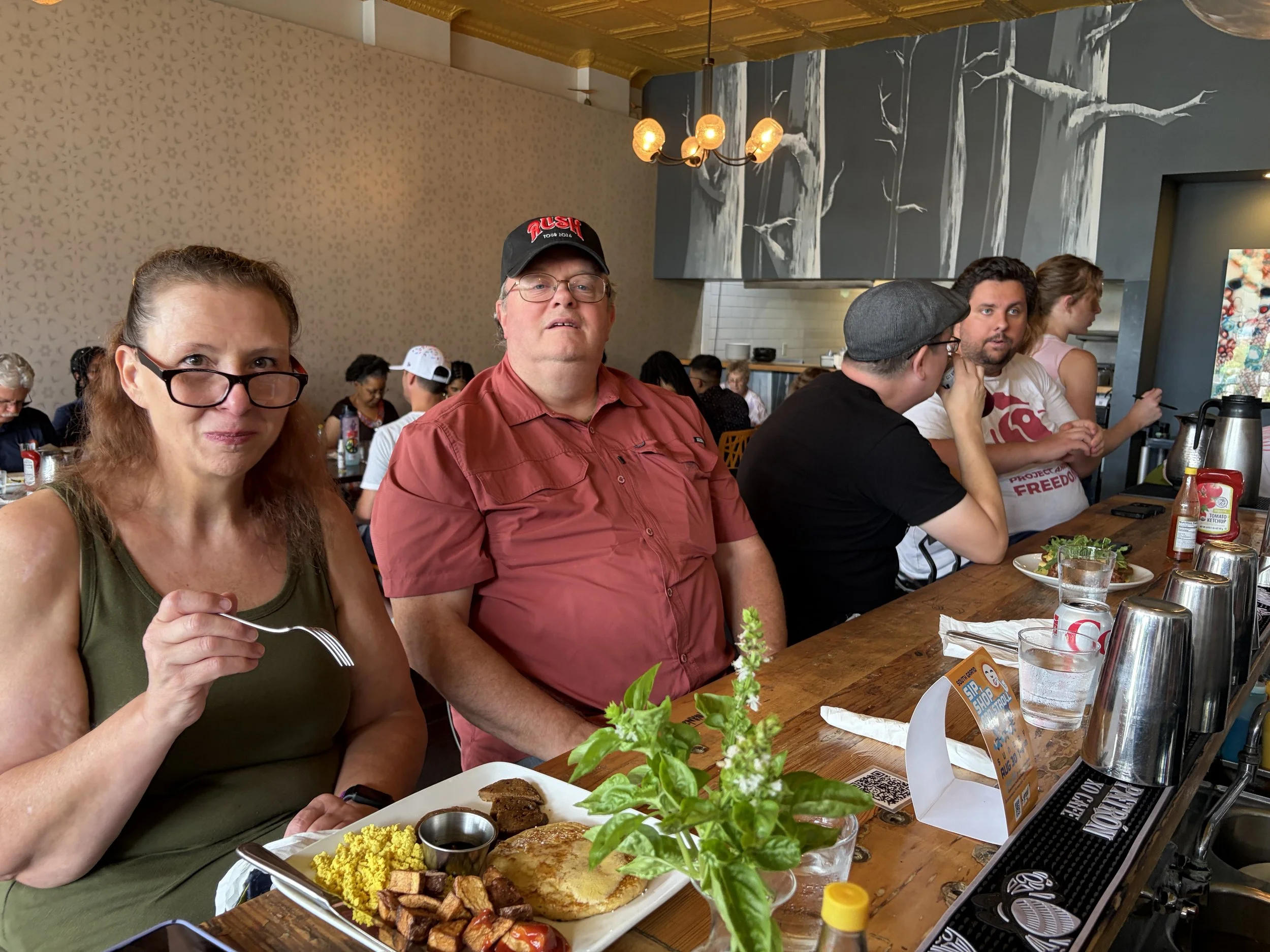 Event-goers delight in plant-based goodness at Vegan Brunch @ Tree House in St. Louis, Missouri.png