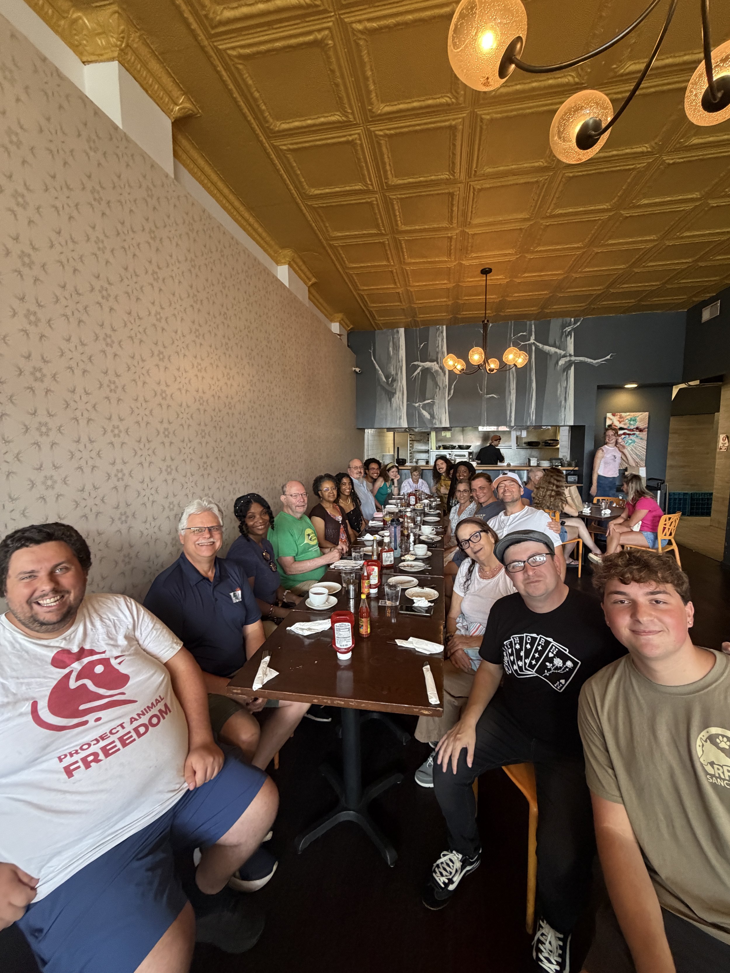 Group of 20+ visitors gather for a delightful Vegan Brunch @ Tree House in St. Louis, Missouri.png