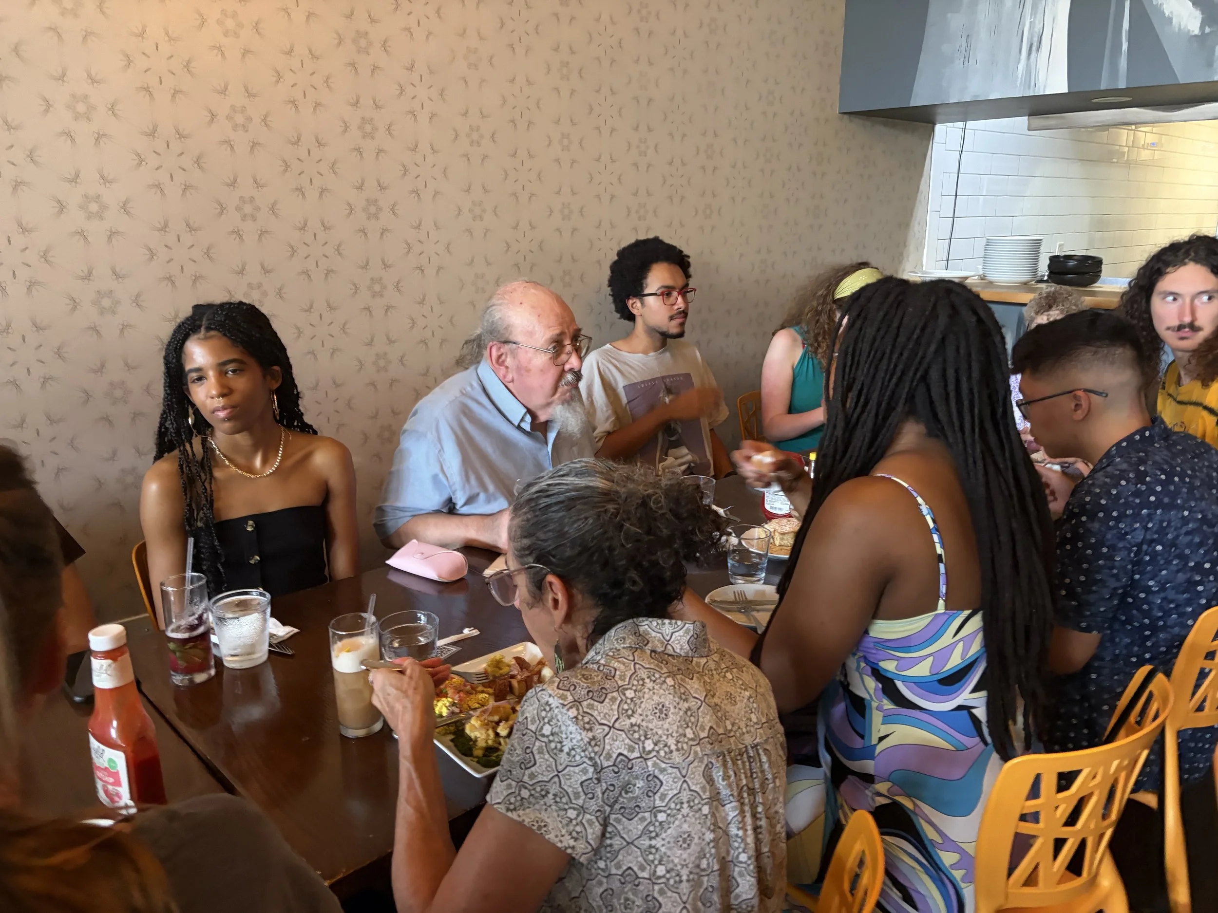 Hungry group of attendees enjoy a plant-powered Vegan Brunch @ Tree House in St. Louis, Missouri.png