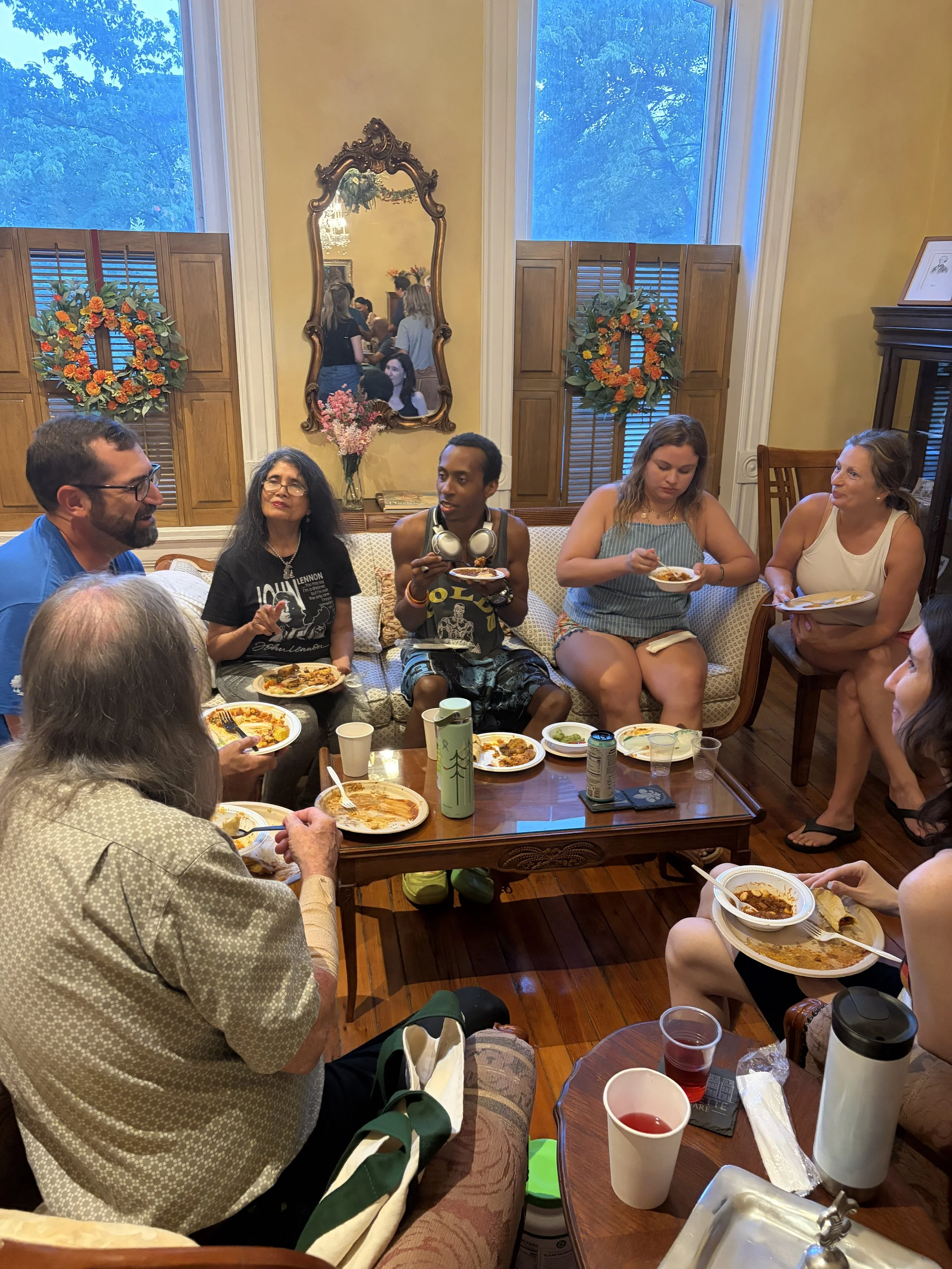Room at Plant Lovers Potluck full with happy and hungry attendees in St. Louis, Missouri.png