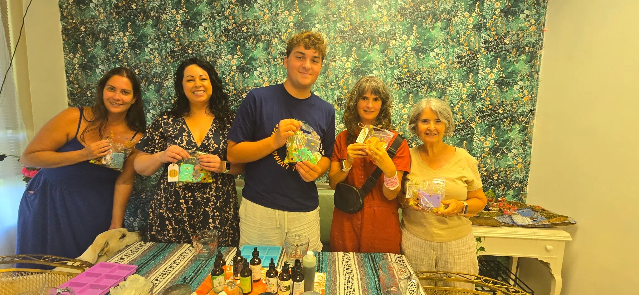 Soap-makers smile for a photo with their finished soaps at Life and Styles Vegan Soap-Making Class in St. Louis, Missouri.png