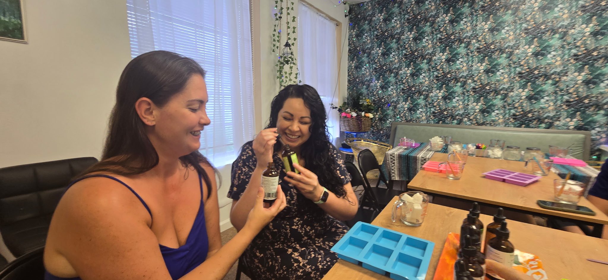 Two attendees sniff the essential oils for Vegan Soap-Making Class at Life and Styles in St. Louis, Missouri.png