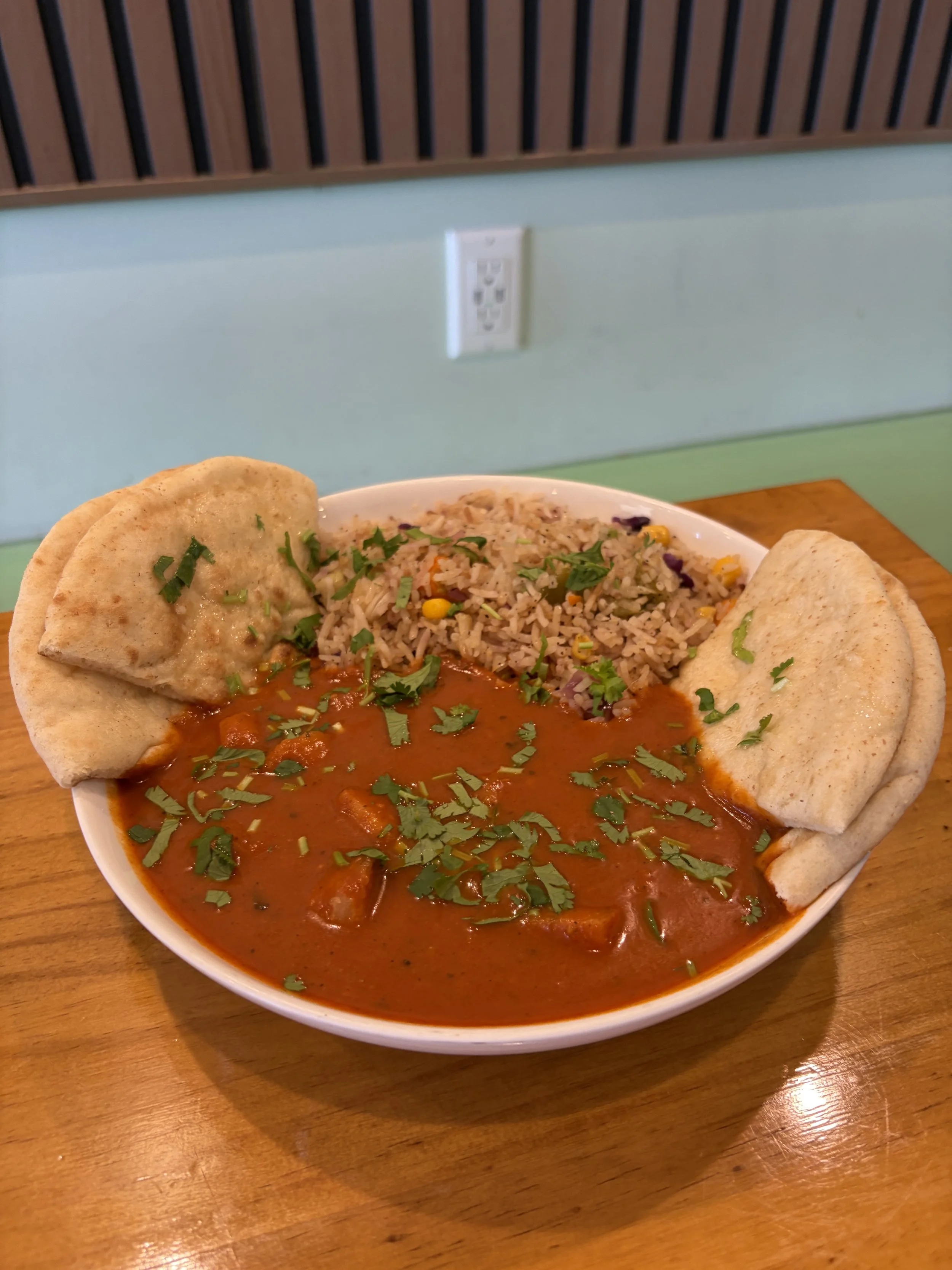 Vegan butter chicken at Ice Cream Social at Bombay Food Junkies in St. Louis, Missouri.png