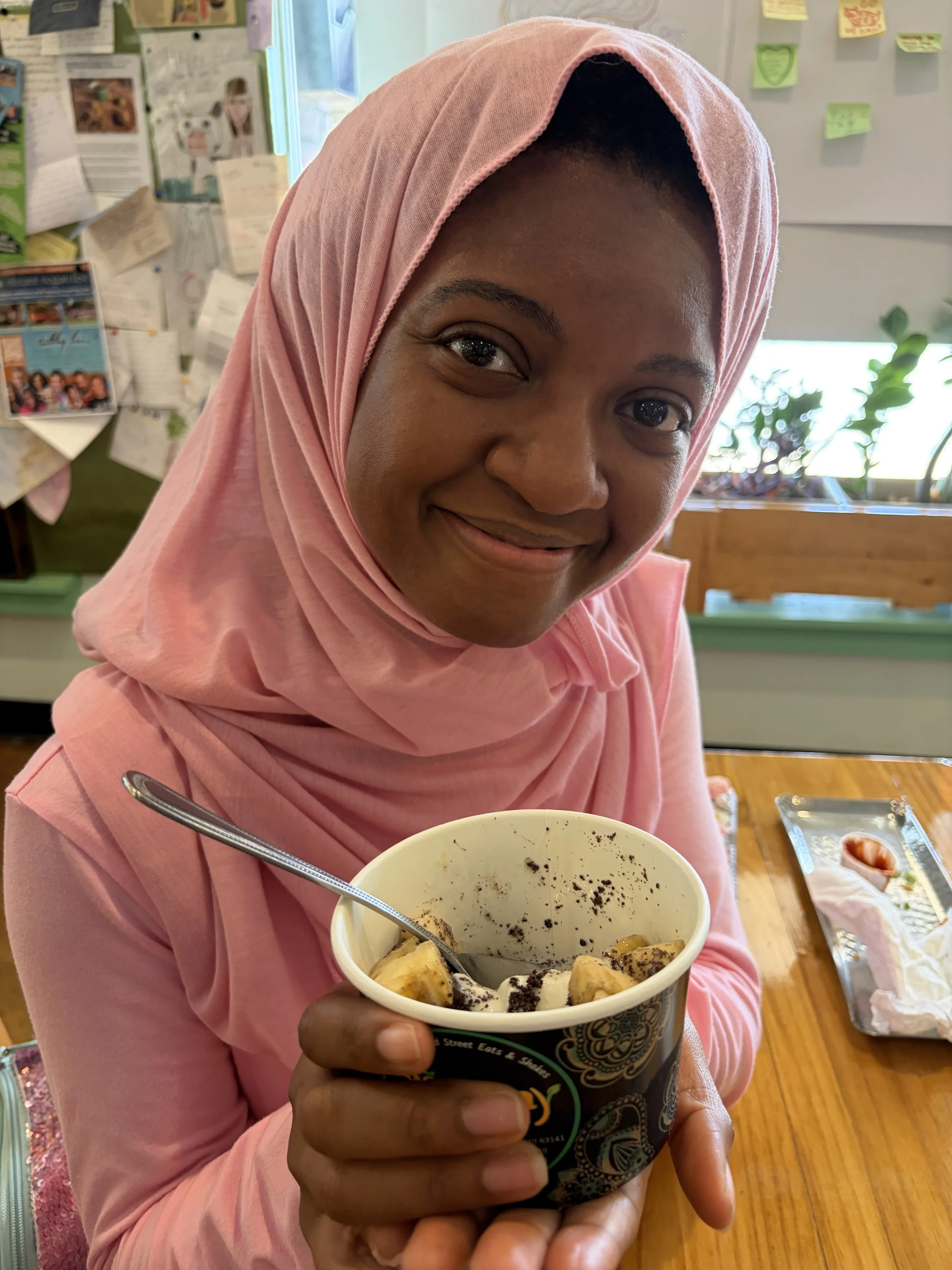 Attendee enjoys vegan ice cream at Ice Cream Social from Bombay Food Junkies in St. Louis, Missouri.png