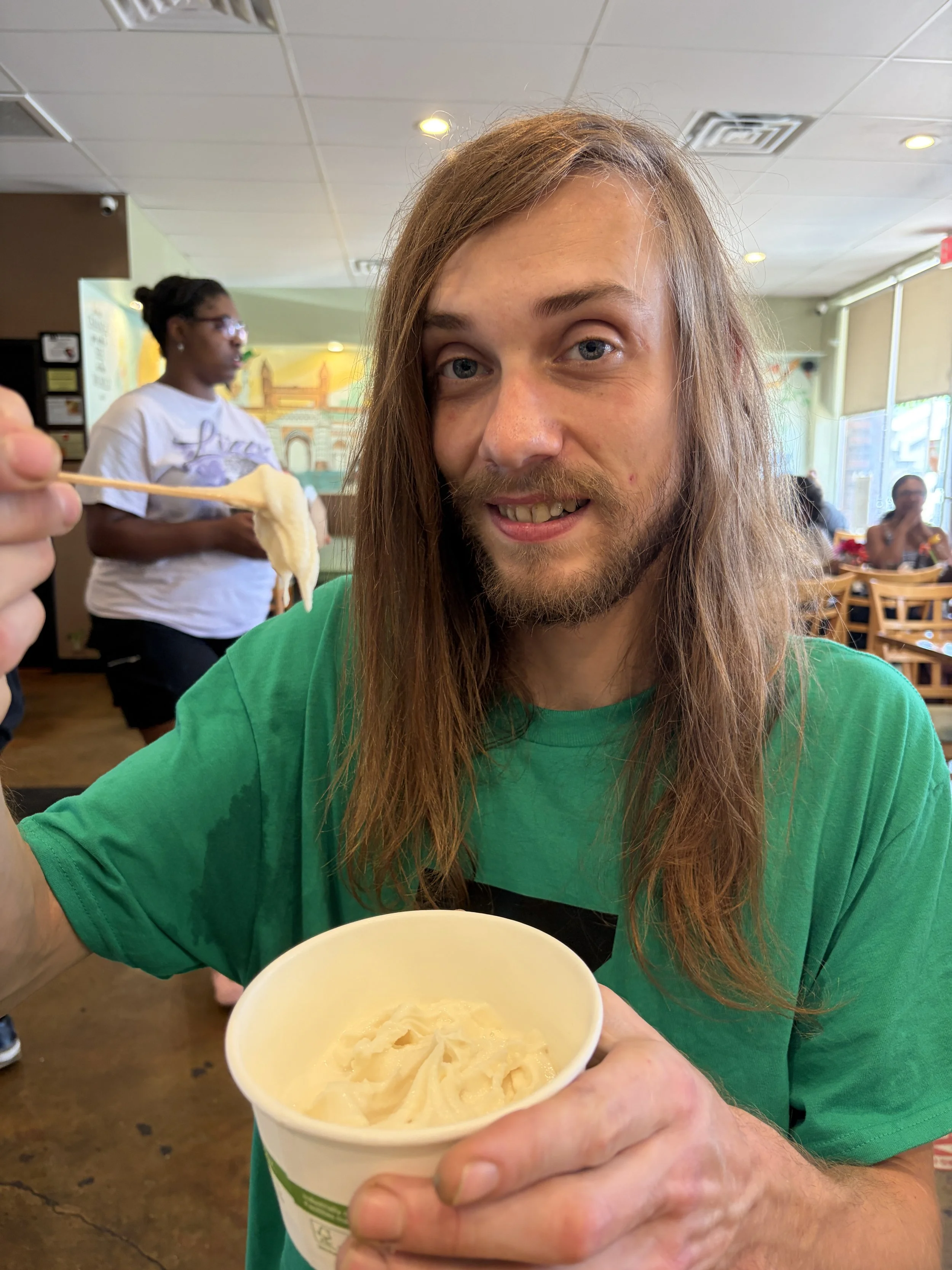 ZManTheVegan enjoys plant-based vanilla sundae at Vegan Ice Cream Social by Bombay Food Junkies in St. Louis, Missouri.png