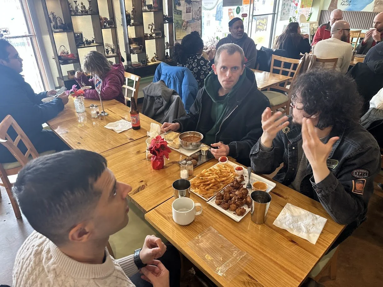 Kameron speaking with Craig at our Veganuary Vegan Ice Cream Social at Bombay Food Junkies in Creve Coeur, Missouri
