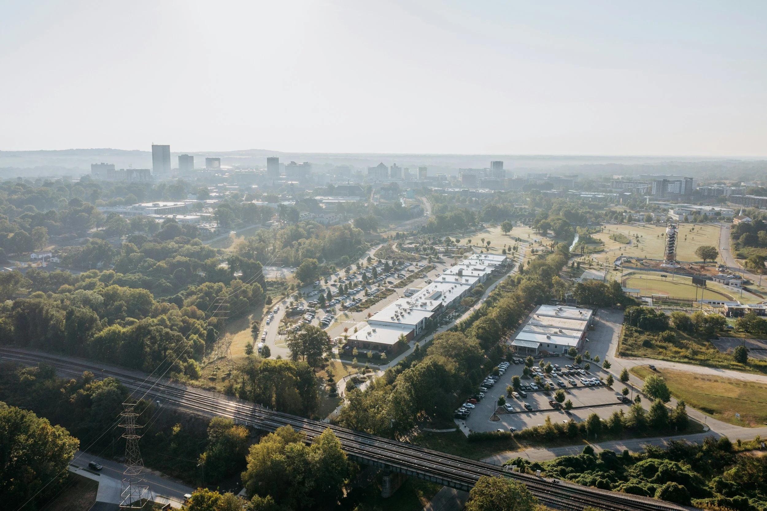 Aerial view of low-rise commercial and industrial buildings in a business park