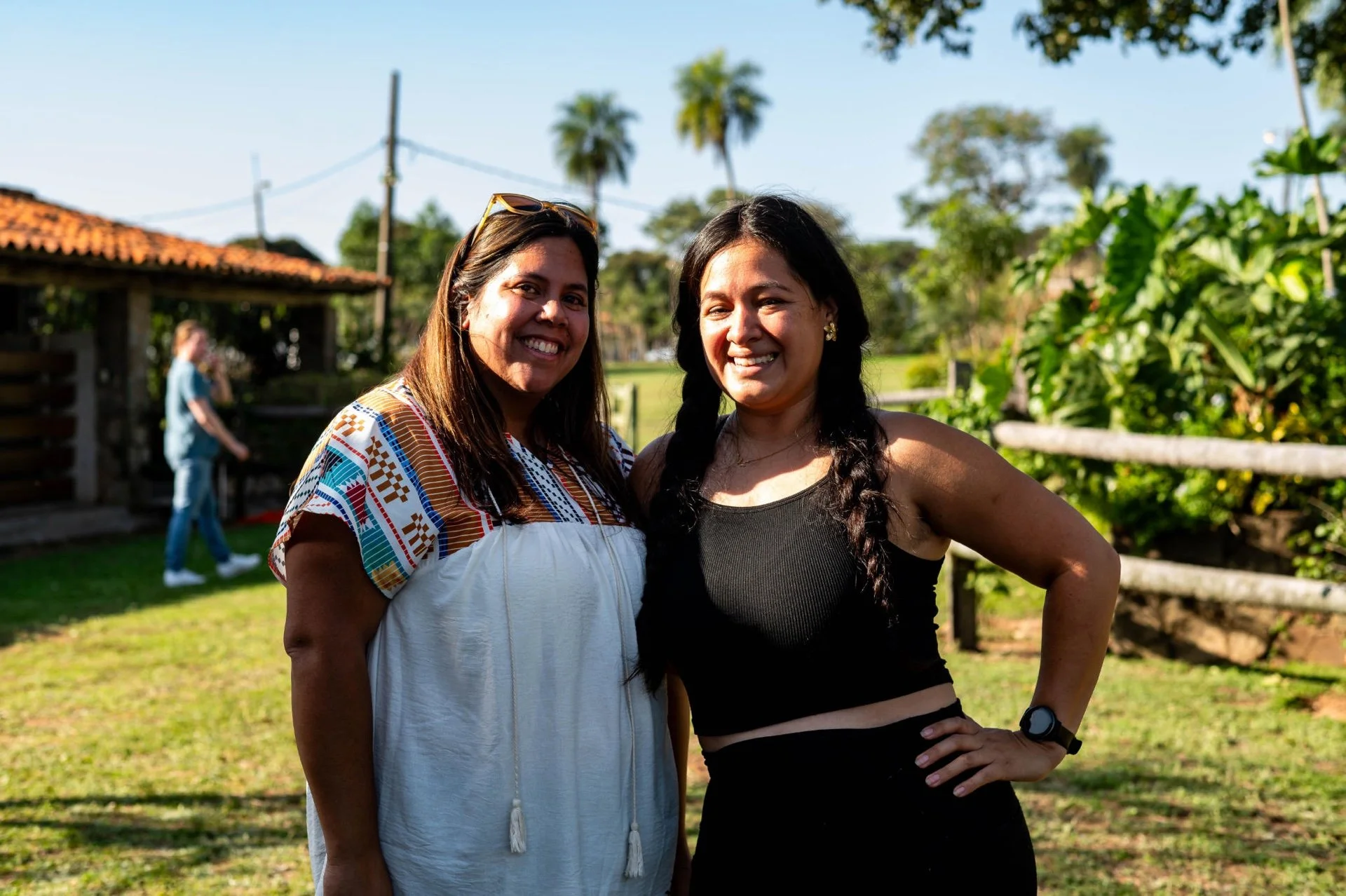 Two women smile for the camera in Paraguay.