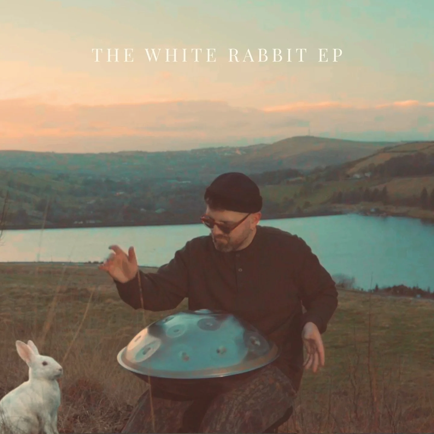 Today I release The White Rabbit EP 🐇

I set out to film a single handpan piece in nature.
On the way, a white rabbit appeared, crossed my path, and led me to a place that felt unmistakably right.

I stayed. I paused, I played.
What followed became 