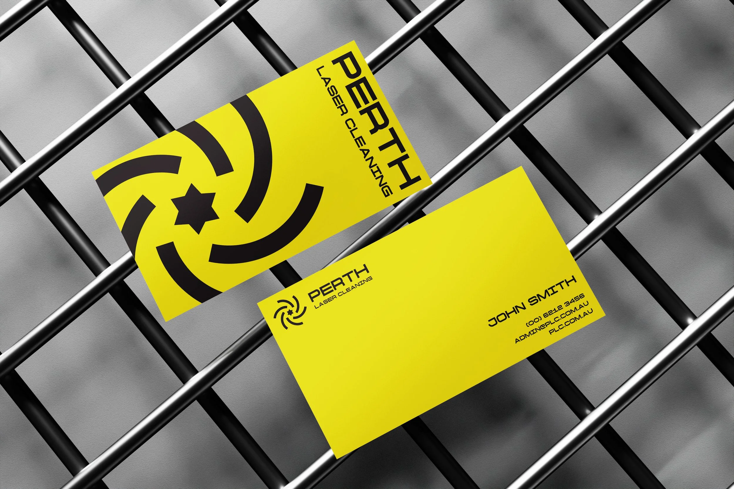 Image of a business card sitting on top of a metal grid