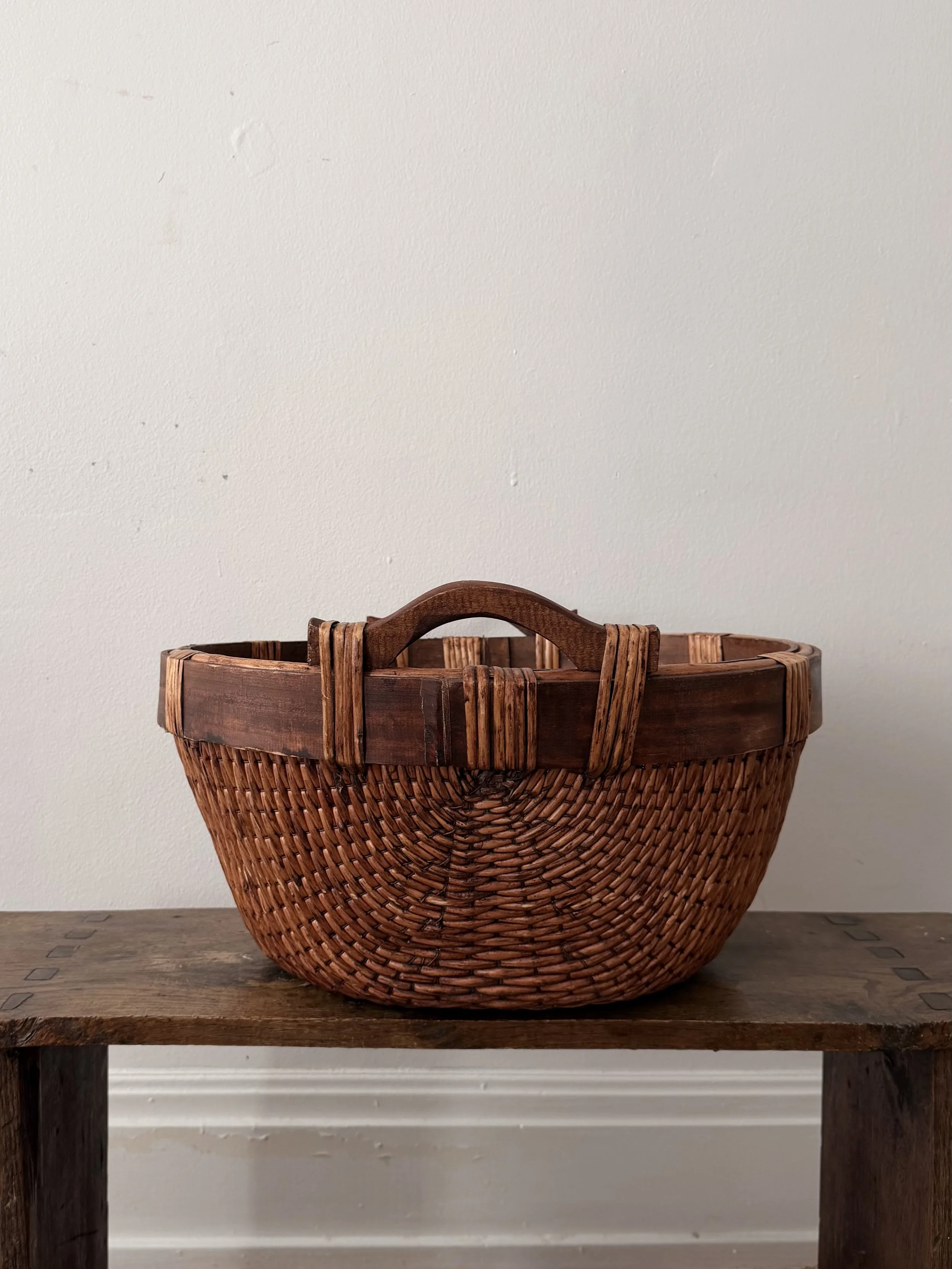Handwoven Rattan Basket with Bentwood Handle