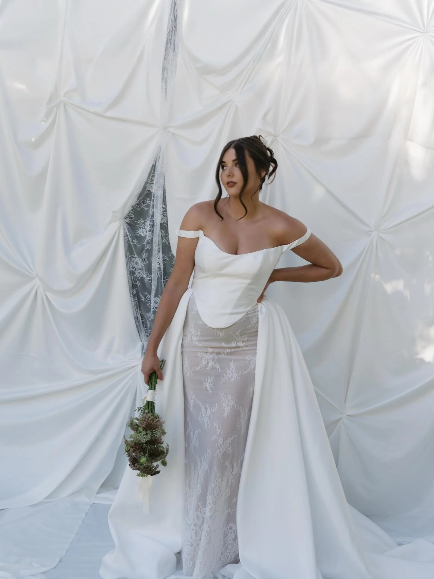 Rara in front of our pinched satin &amp; lace backdrop. Such a romantic, dainty combo! 

CREATIVE TEAM
Venue- @braesideestategc
Planner &amp; Stylist-@vowsandthings
Photo &amp; Video- @beatrizweddings
Content Creation-@byemmagourlay
Tables-@outofthed