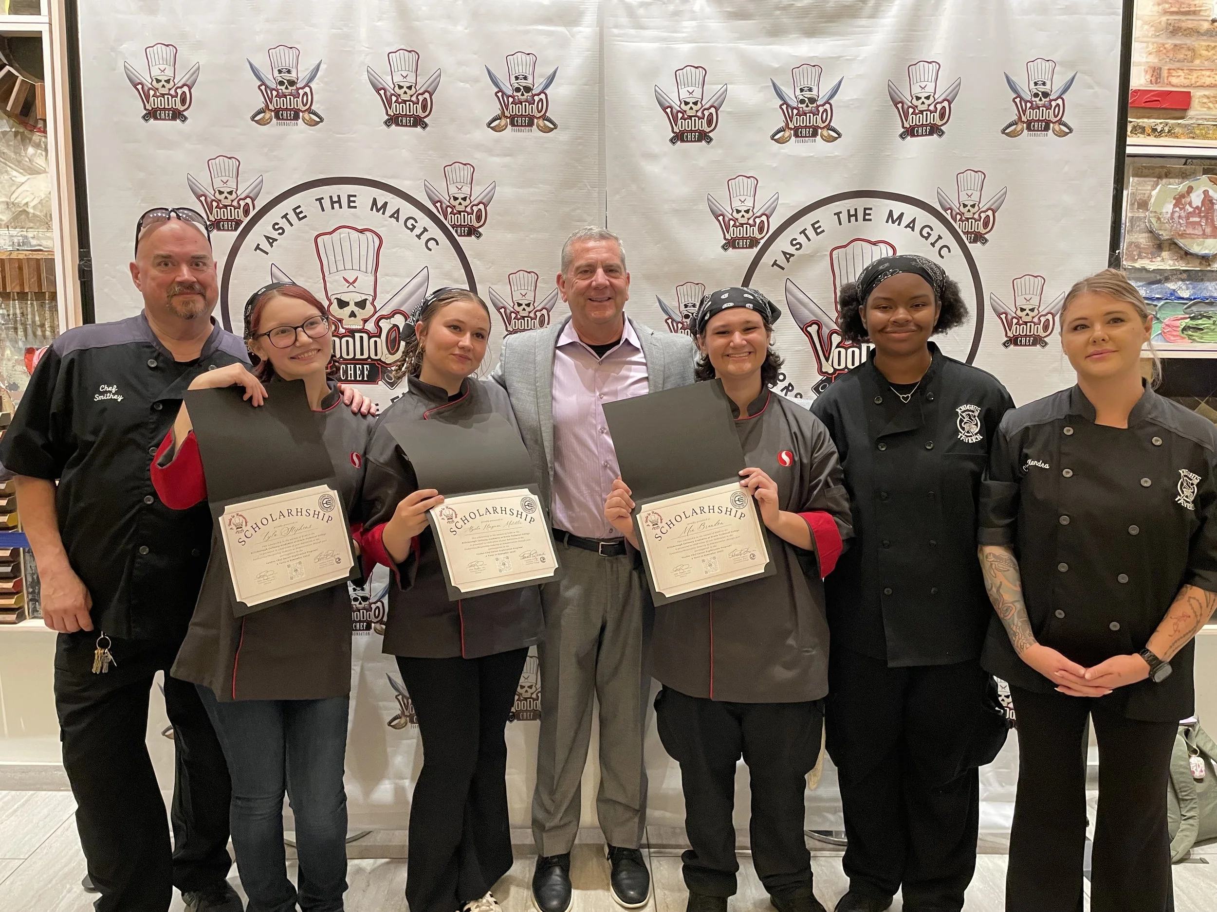 4 of our Tavern Knights receive a scholarship to Erwin Technical College! While standing beside the teachers who supported them!