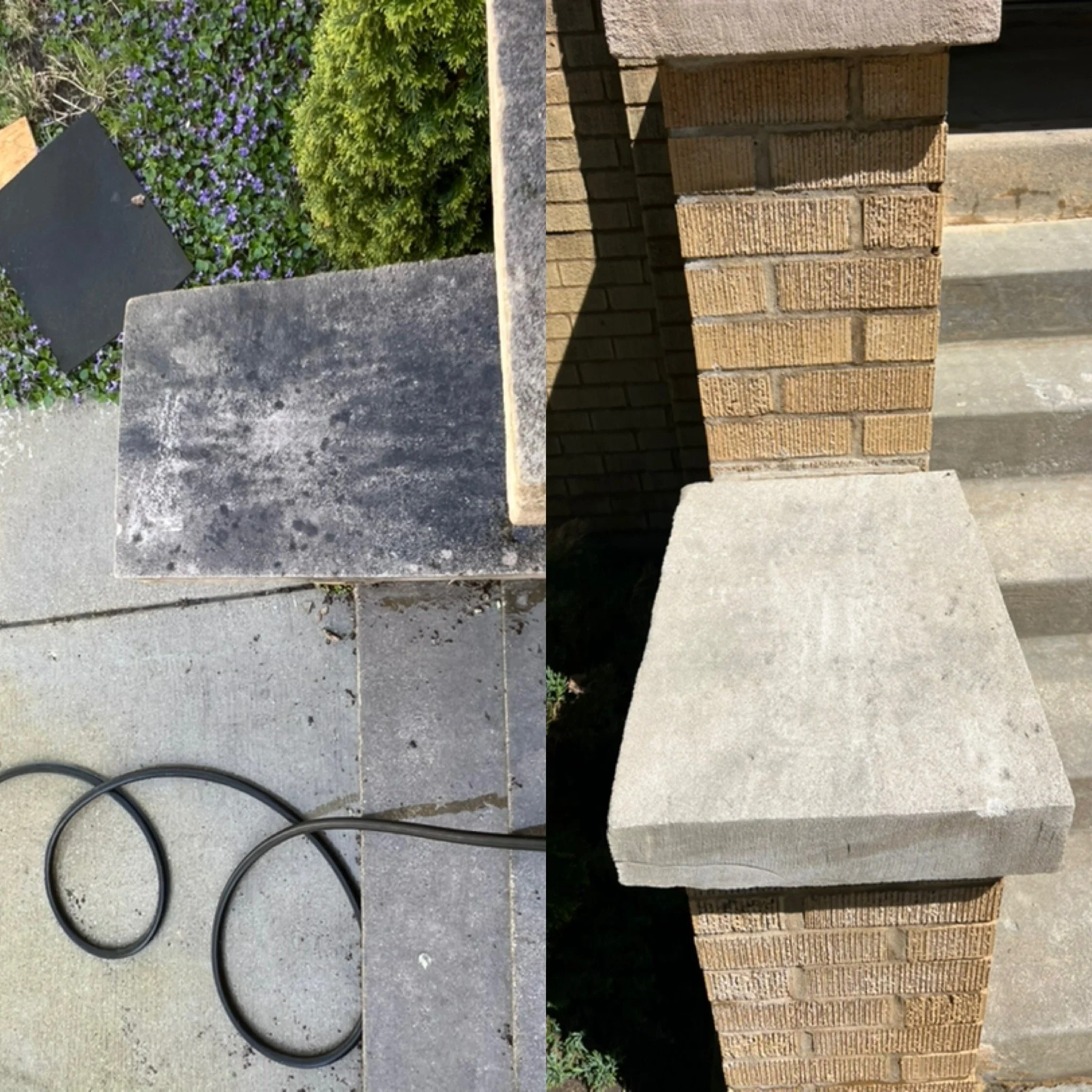 Close-up of a brick wall with a concrete pillar in front, green bushes with purple flowers, and a black metal chair on a concrete surface.