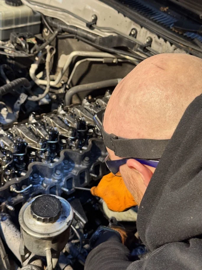 Schneidx Auto Care’s detail-oriented technicians meticulously working on a vehicle in Clayton South, VIC 3169 – precision and care in every repair