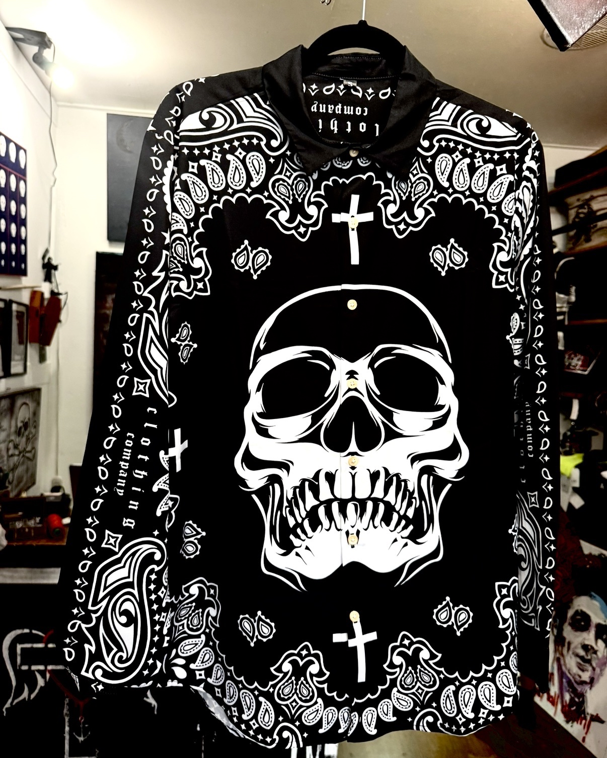 black and white bandit  long-sleeved collared shirt with white skull and swirly pattern and white cross on top  inspired by Los Angeles street gang bandannas (front)