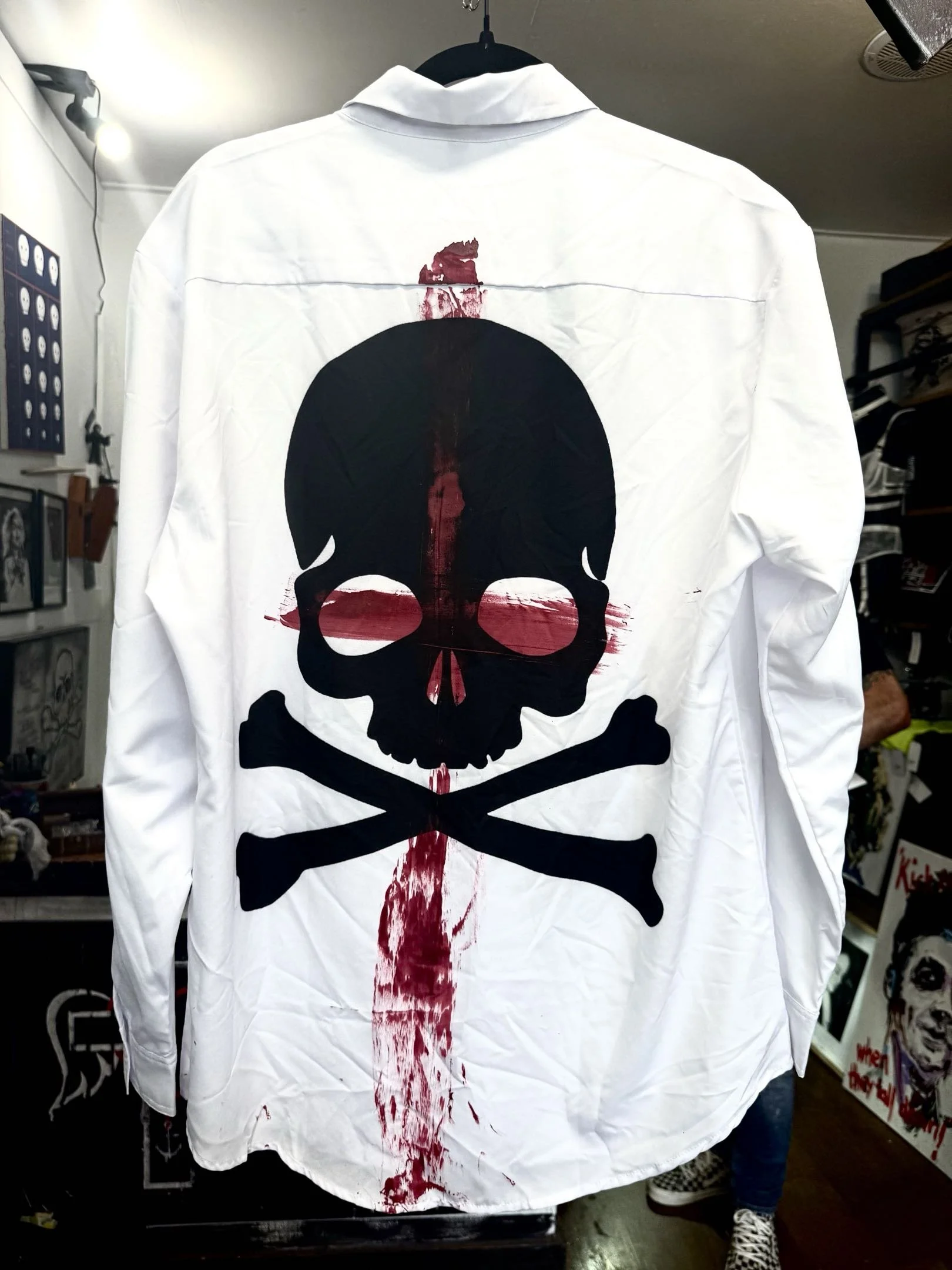 reverence delinquent long-sleeved white collared shirt with large black skull print and red blood cross over it (back)