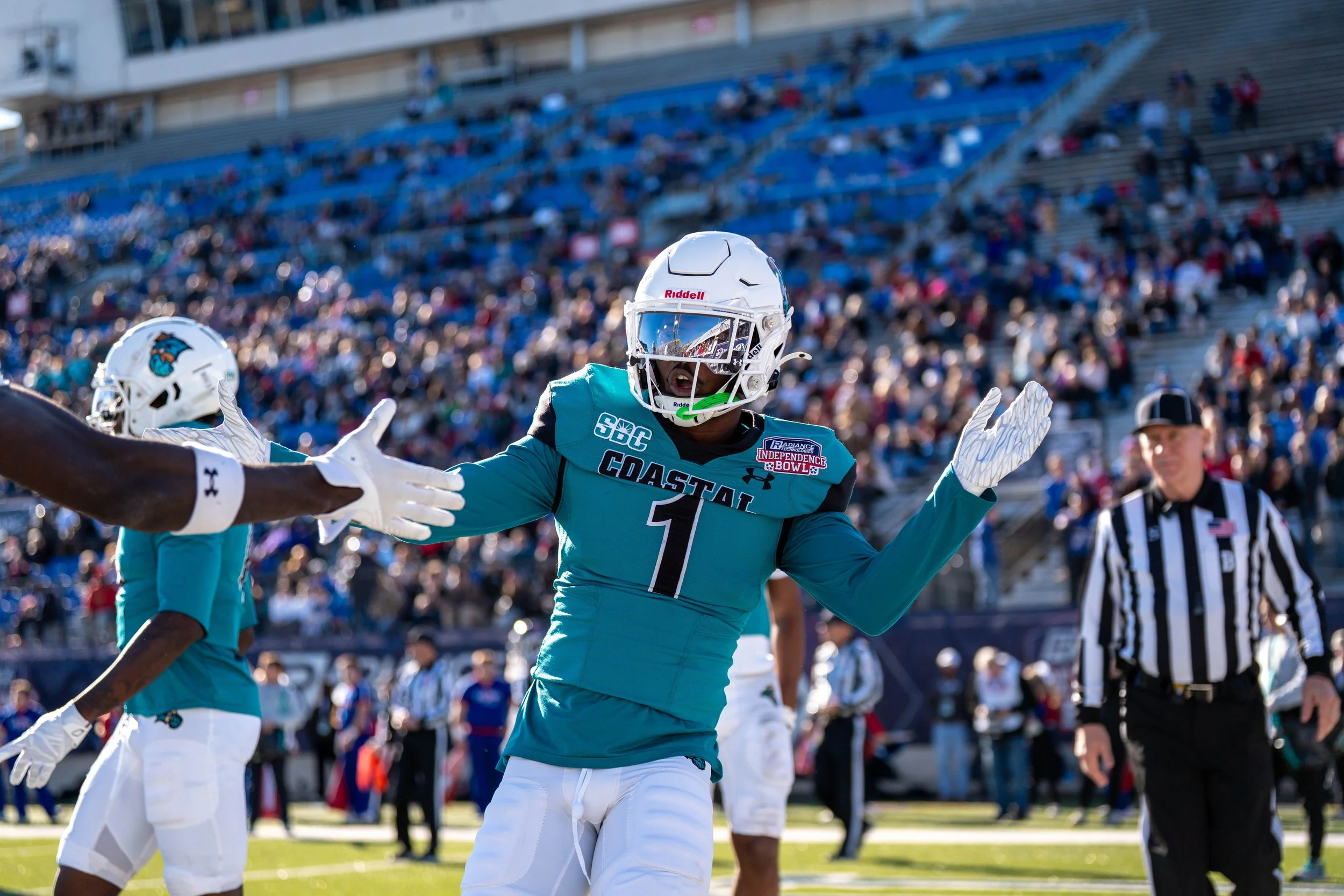 Coastal Carolina Players celebrates a touchdown