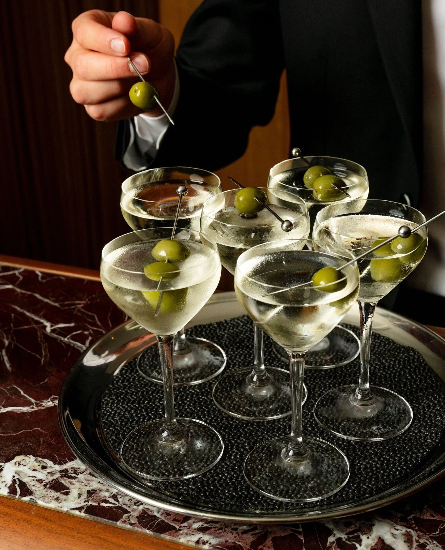 The Classic Martini - the Fugazzi staple, understated and deliberate.⁠
⁠
Gin meets vermouth, a whisper of bitters, and a few choice olives.⁠
⁠
Enjoy it classic, dirty, or filthy.⁠
⁠
FUGAZZI&reg;️⁠
⁠
#Fugazzi #Martini #DrinksList⁠