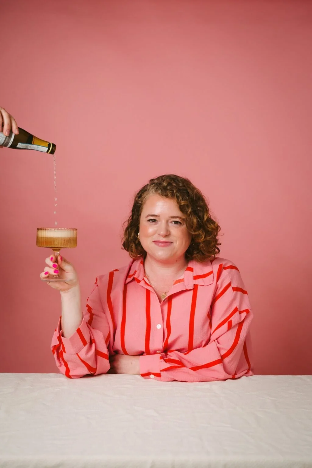 YOLO business coach jo hooper with prosecco