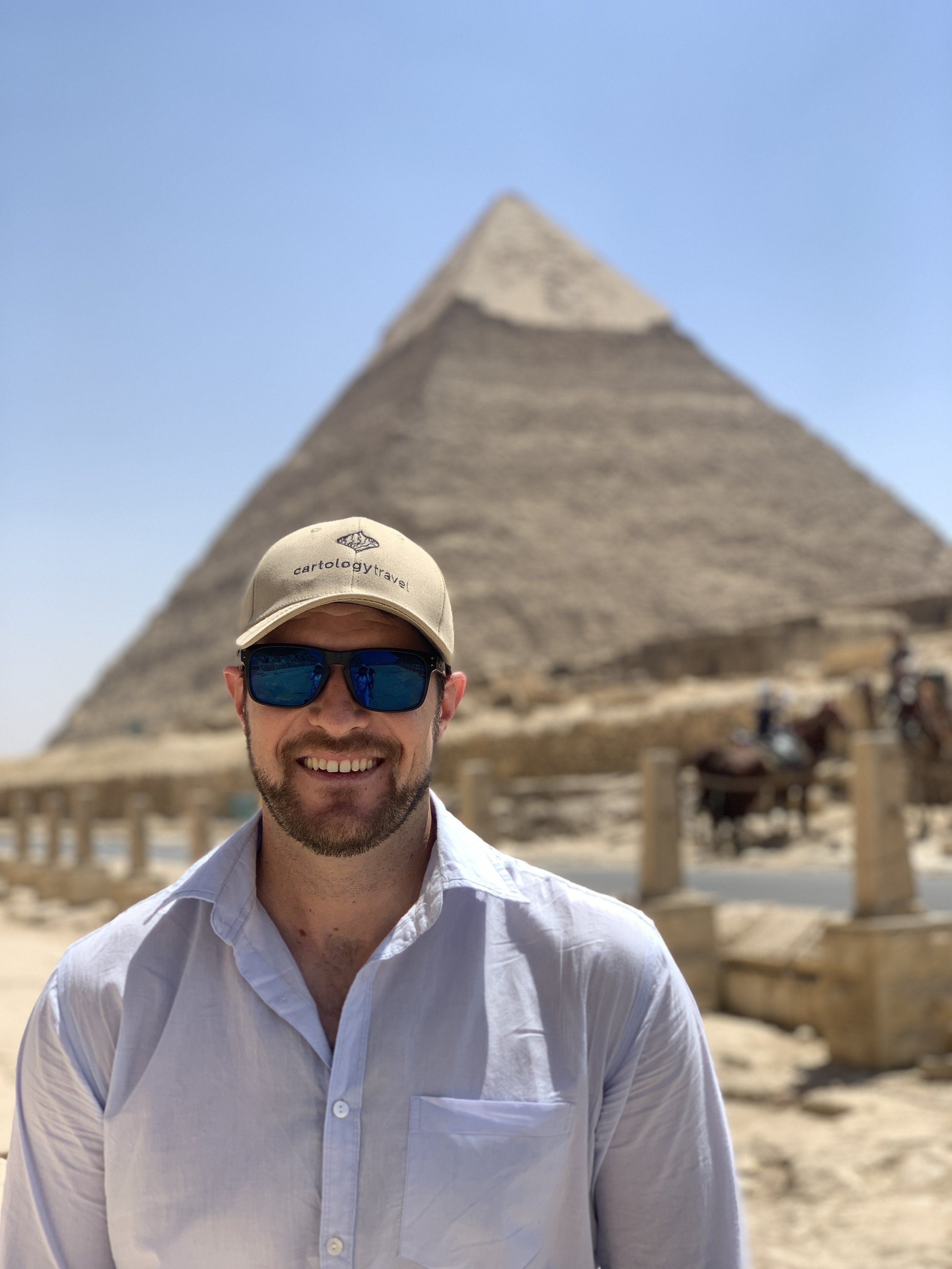 A headshot of Cartology Travel founder, Justin Huxter in Egypt