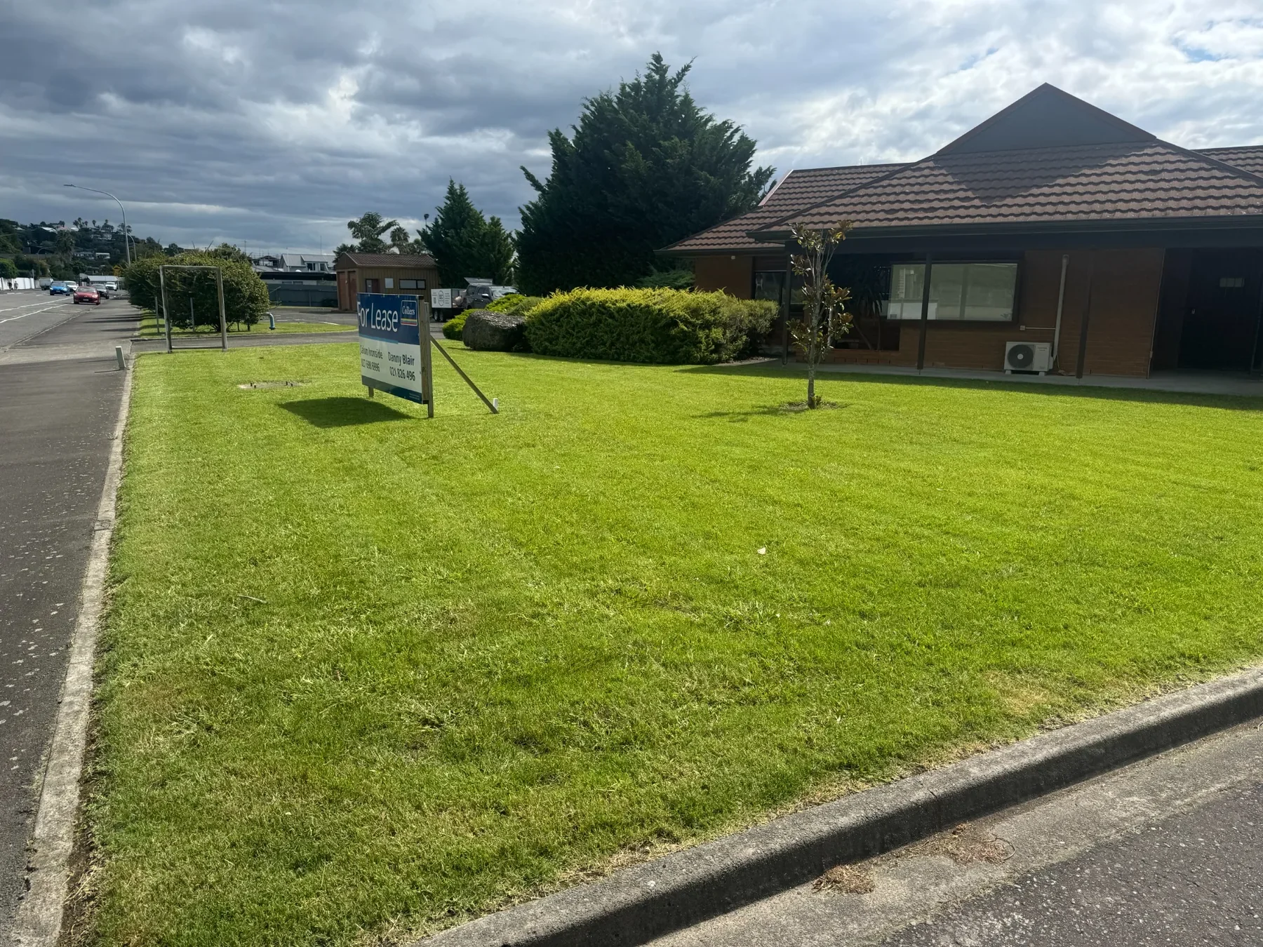 Maintained lawns and landscaped grounds outside a commercial office building