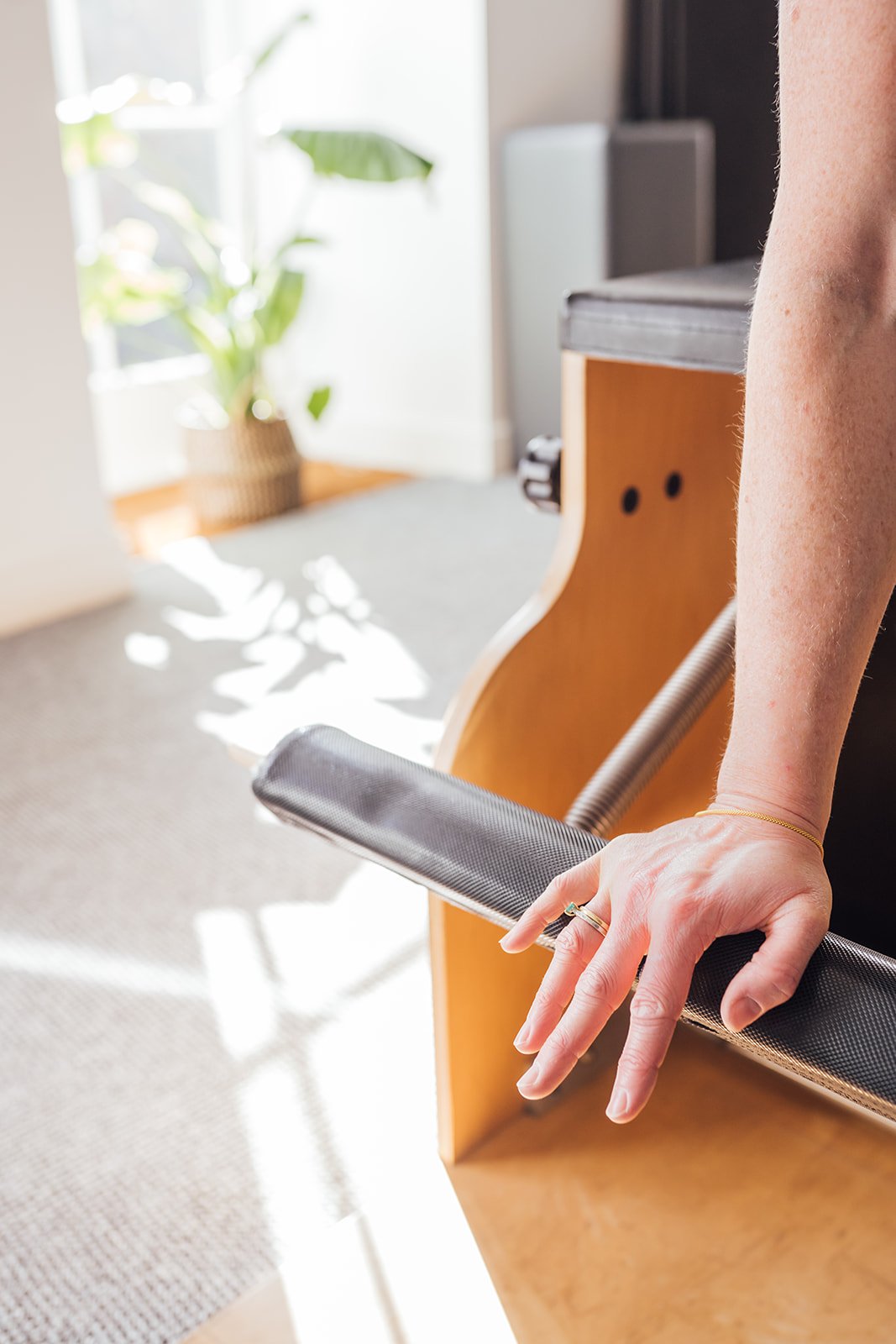 Client taking part in a Pilates session in a calm Shrewsbury studio