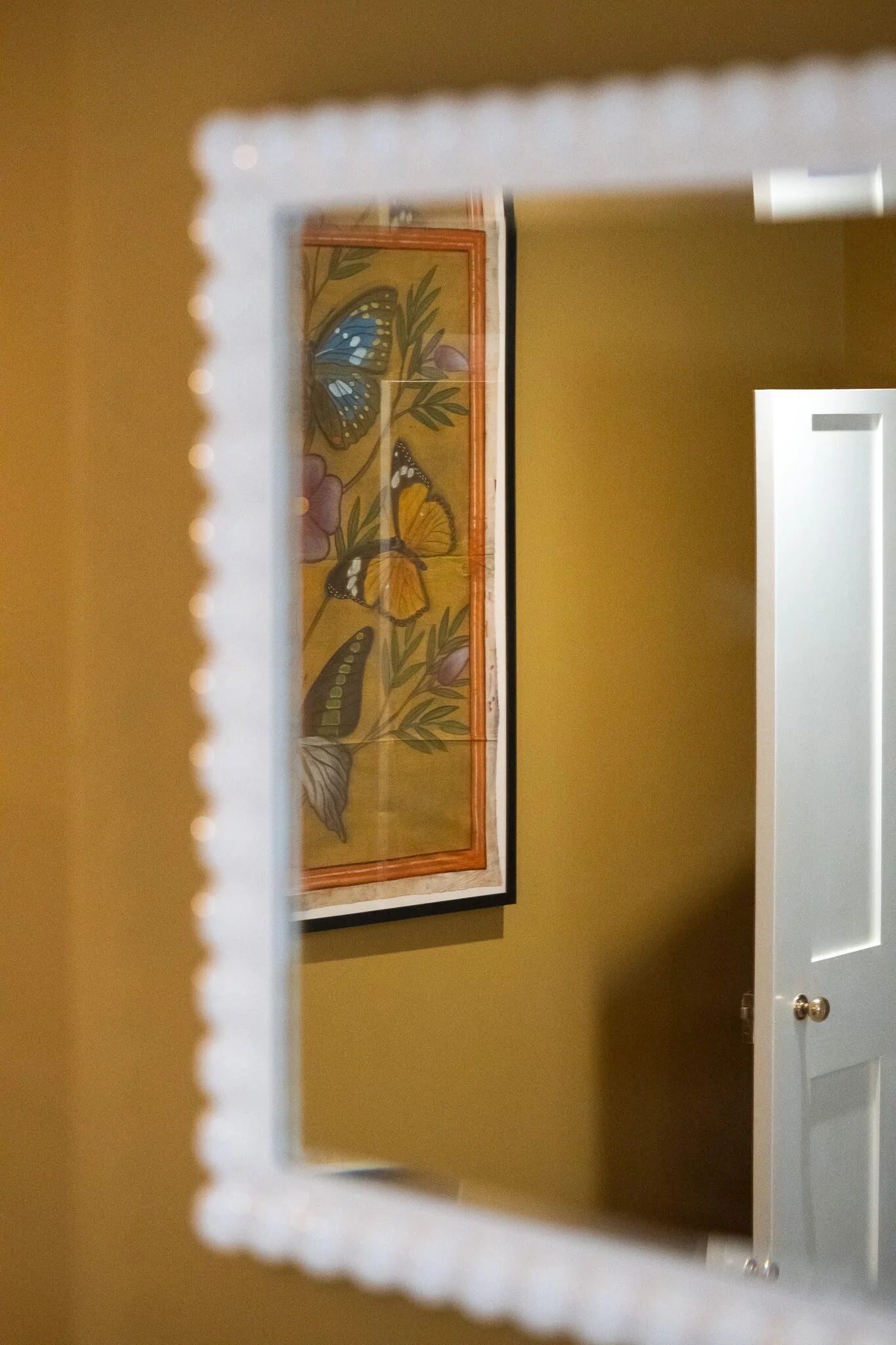 Indian yellow bedroom in coastal property