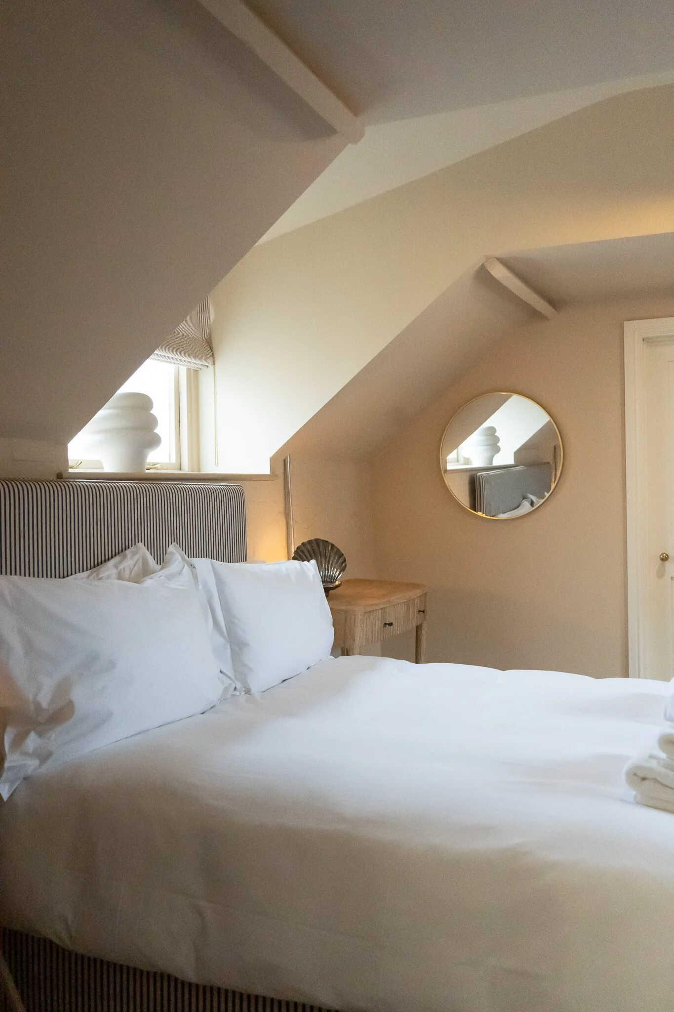 Coastal styled bedroom in luxury Norfolk holiday rental