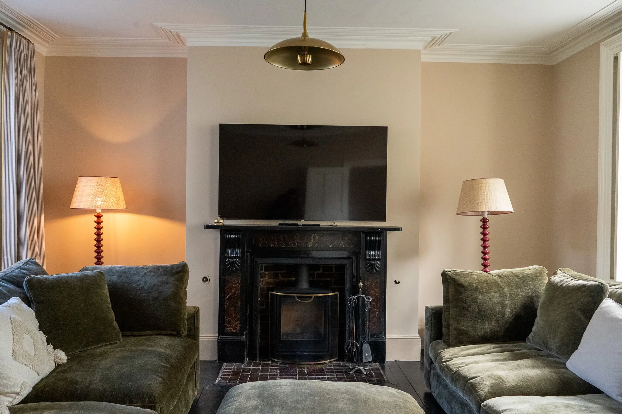 Huge family forest green sofa in relaxing Norfolk holiday rental