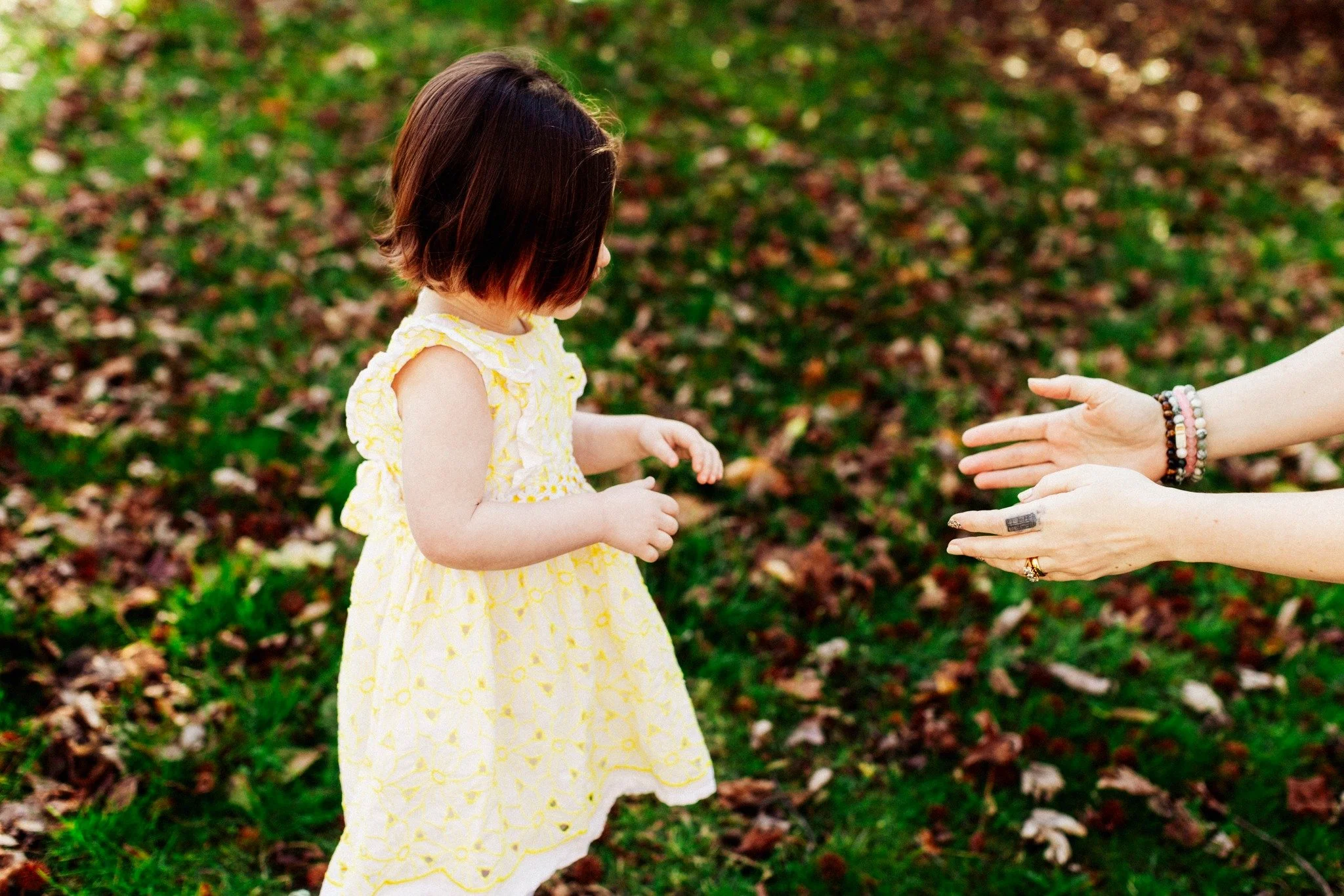Part 3 - I wanted to show some shots from this family session that aren't "typical." 

Yes, the posey, smiley shots are a necessary part of a family session. But I really enjoy documenting the little moments in between. A good technique in 