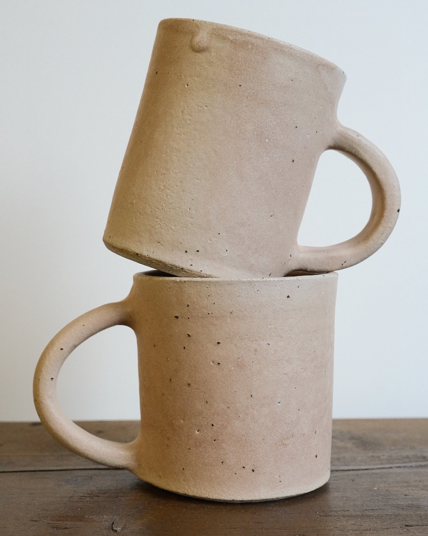 Latest mugs out of the kiln, my first in this new glaze. The blush pink/peach colour almost reminds me of Venetian plaster, and I love the speckle of the clay showing through 

#pottery #potteryforall #potteryofinstagram #potterylove #potteryglaze #p