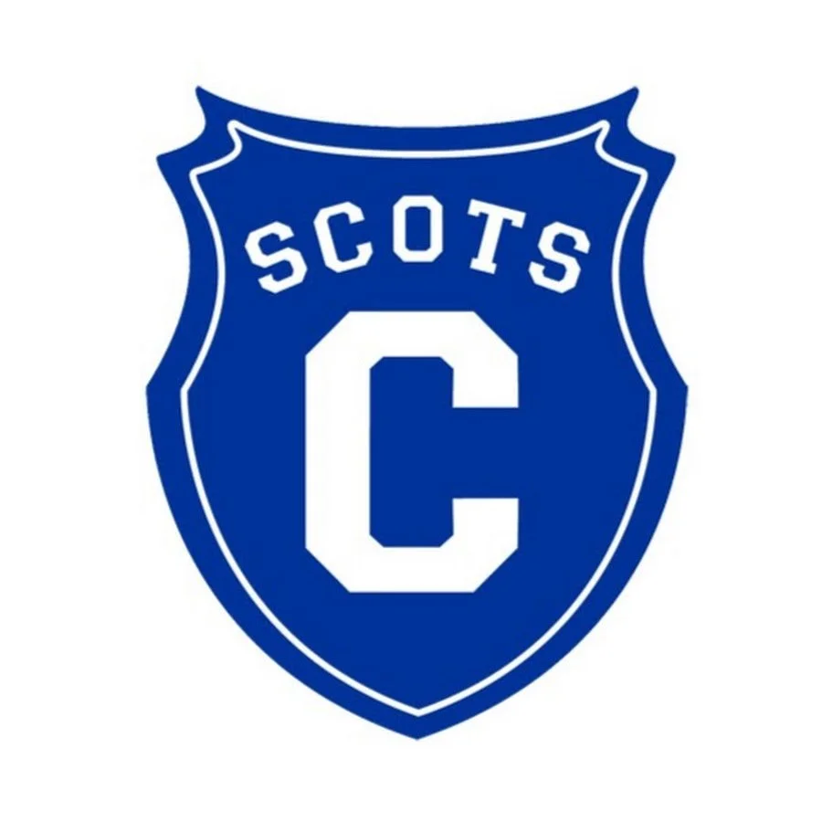 A blue shield-shaped sports logo with white outlines, featuring the word 'SCOTS' at the top, a large letter 'C' in the center, and the shield's border outlined in white.