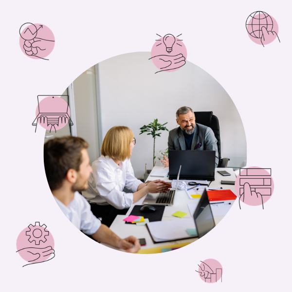Three people having a discussion in an office with laptops, papers, and office supplies, surrounded by pink icons representing ideas, collaboration, and technology.