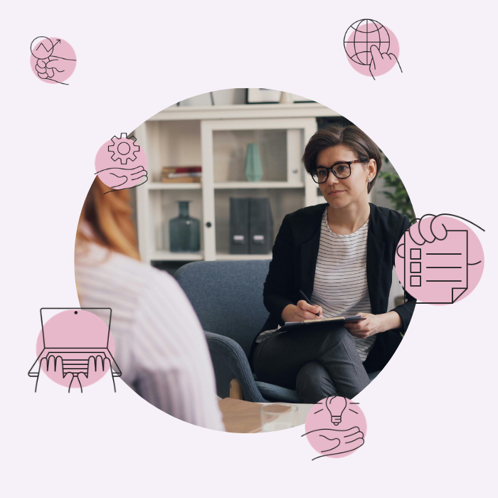 Therapist taking notes during a session with a client in an office setting, with icons representing communication and professional services around the image.
