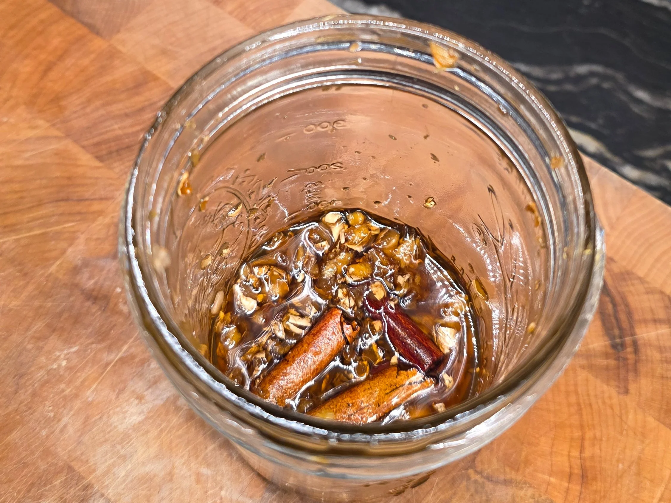 Cinnamon-ginger infused honey made using leftover ginger pulp as part of a zero-waste kitchen experiment.