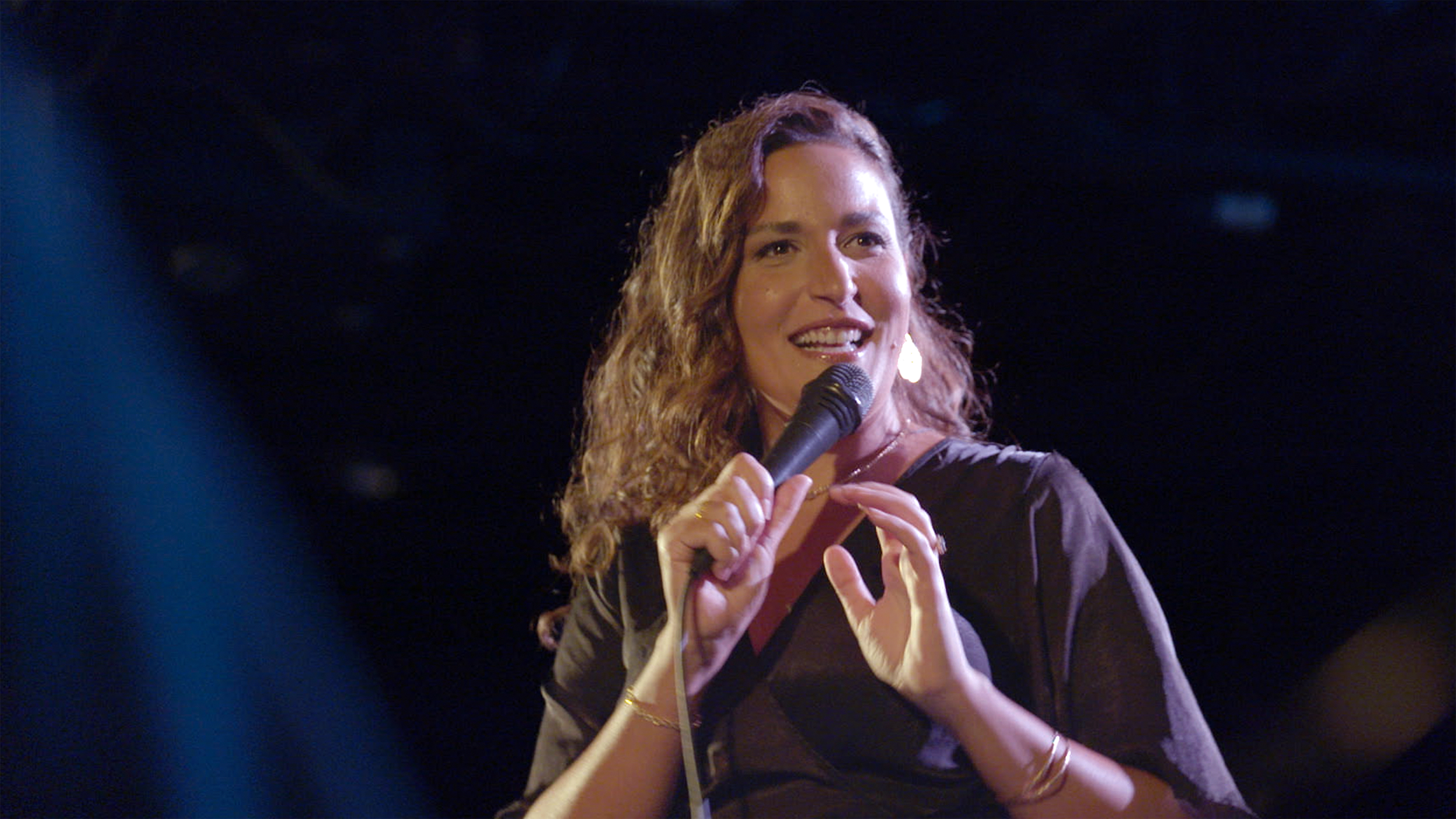 Noam Shuster Eliassi performing her one woman comedy show - credit Coexistence My Ass