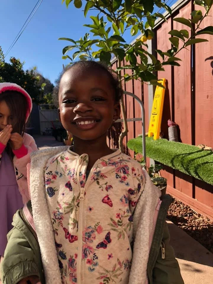 A smiling child at school