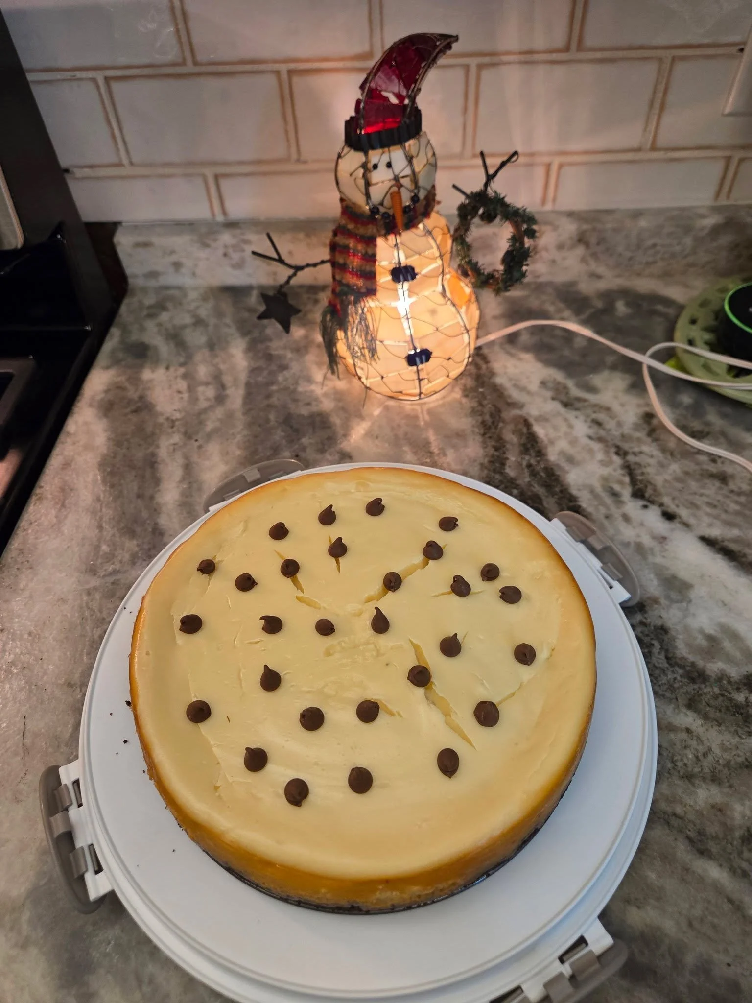 Even though I'm not a fan of cooking some days, I love to bake. Homemade Cheesecake with chocolate crust. 🍰

We're just going to ignore the cracked top and distract the eye with mini chocolate morsels on top.😉