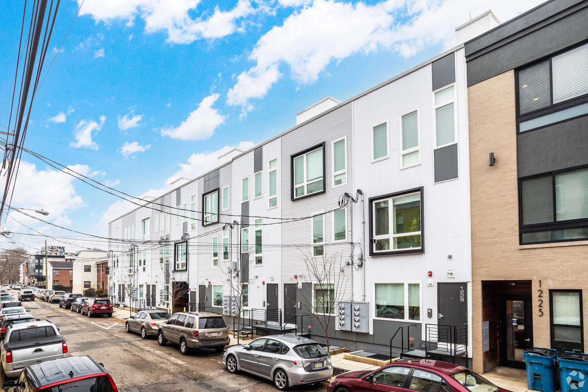 Exterior view of townhouse living at Brewery Row Apartments in Brewerytown Philadelphia.