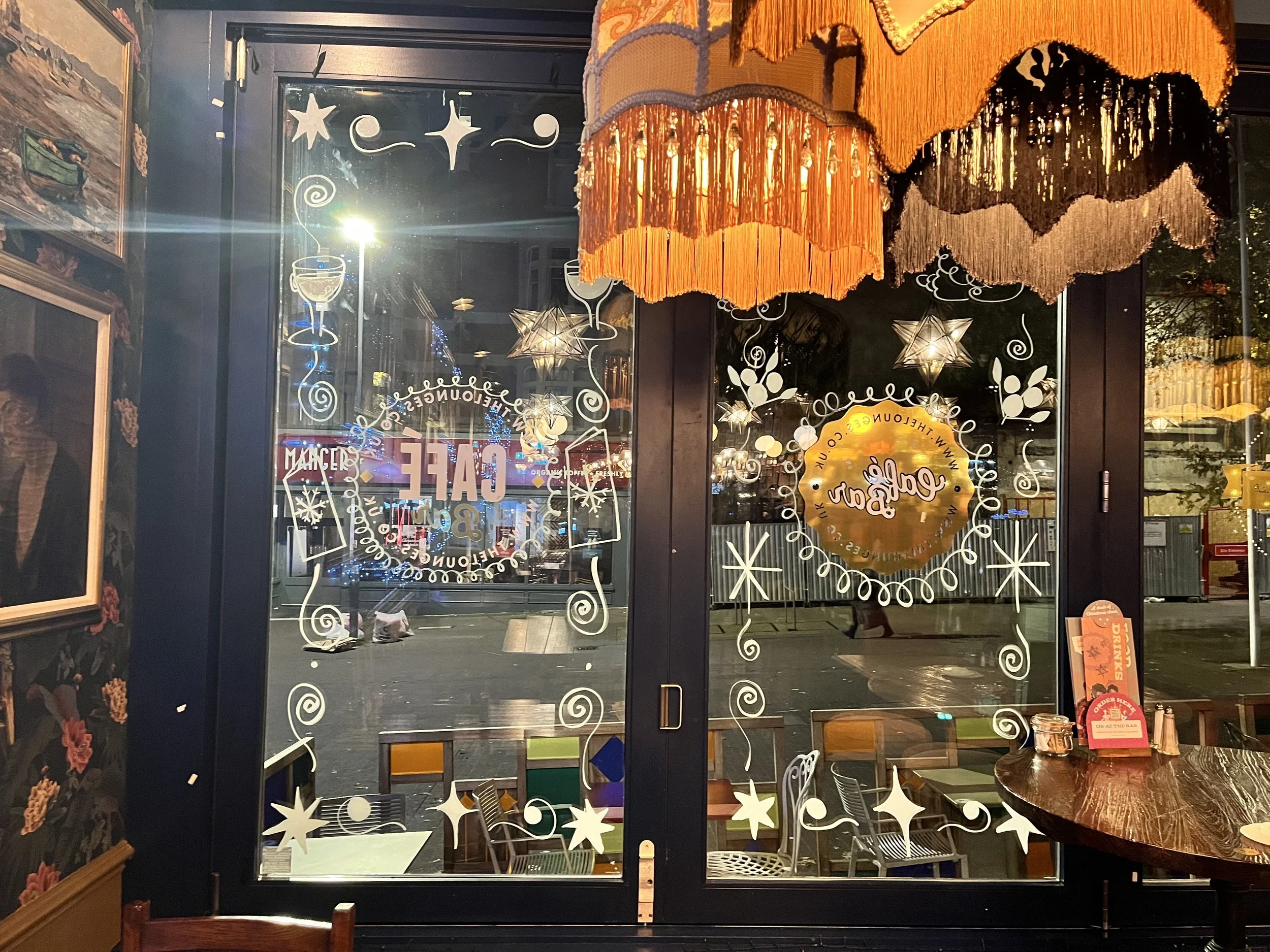 Christmas Motif Illustrations on the Bi-fold Windows for the Indoor Display using White Acrylic Markers, (2025)