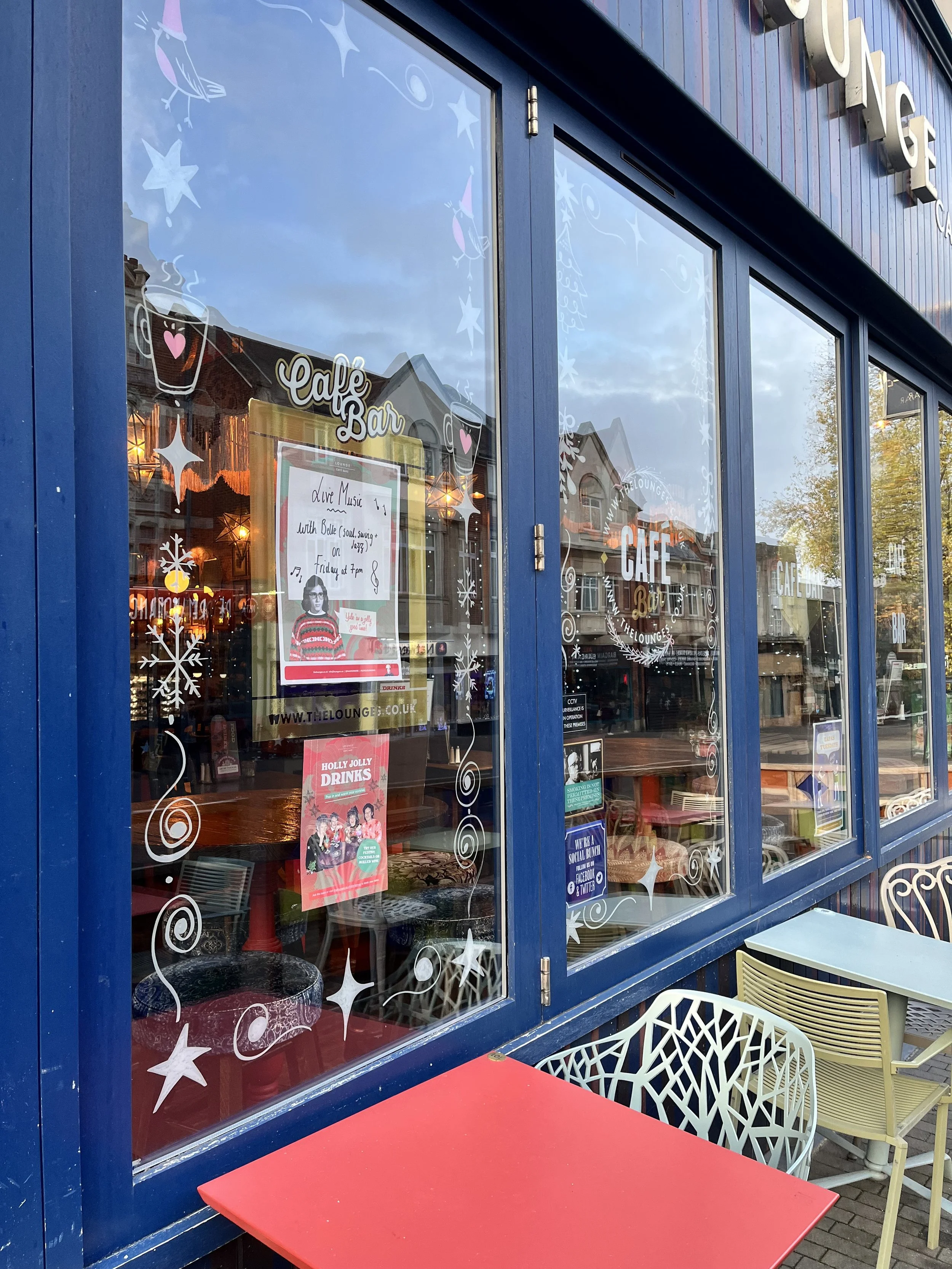 Christmas Motif Illustrations on the Bi-fold Windows for the Indoor Display using White Acrylic Markers, (2025)