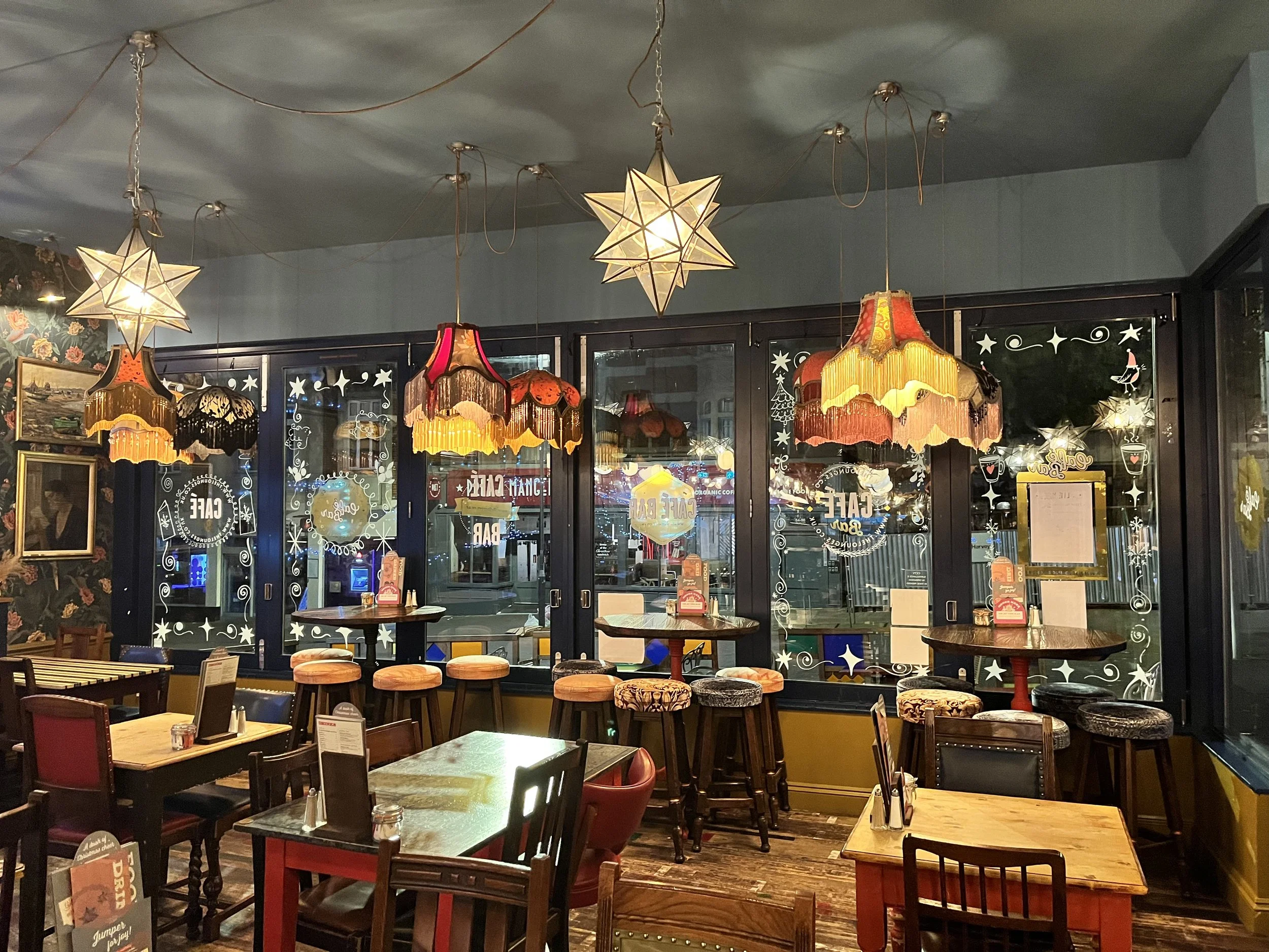 Christmas Motif Illustrations on the Bi-fold Windows for the Indoor Display using White Acrylic Markers, (2025)