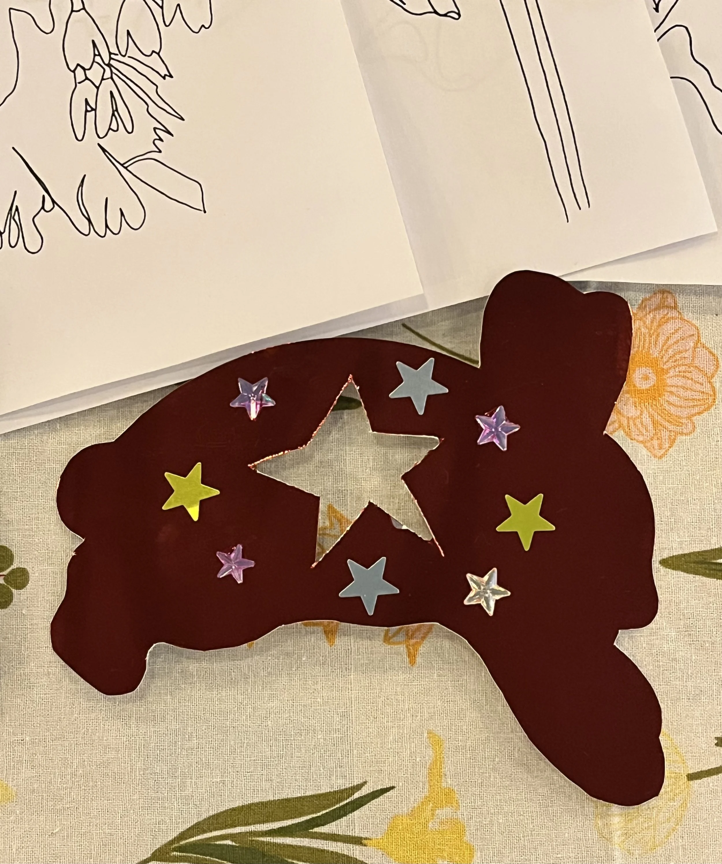 Example of the crafts, some of the children made today. Embellished rabbit made of Metallic Coloured Paper with Star Stickers and Plastic Jewels. (2026).